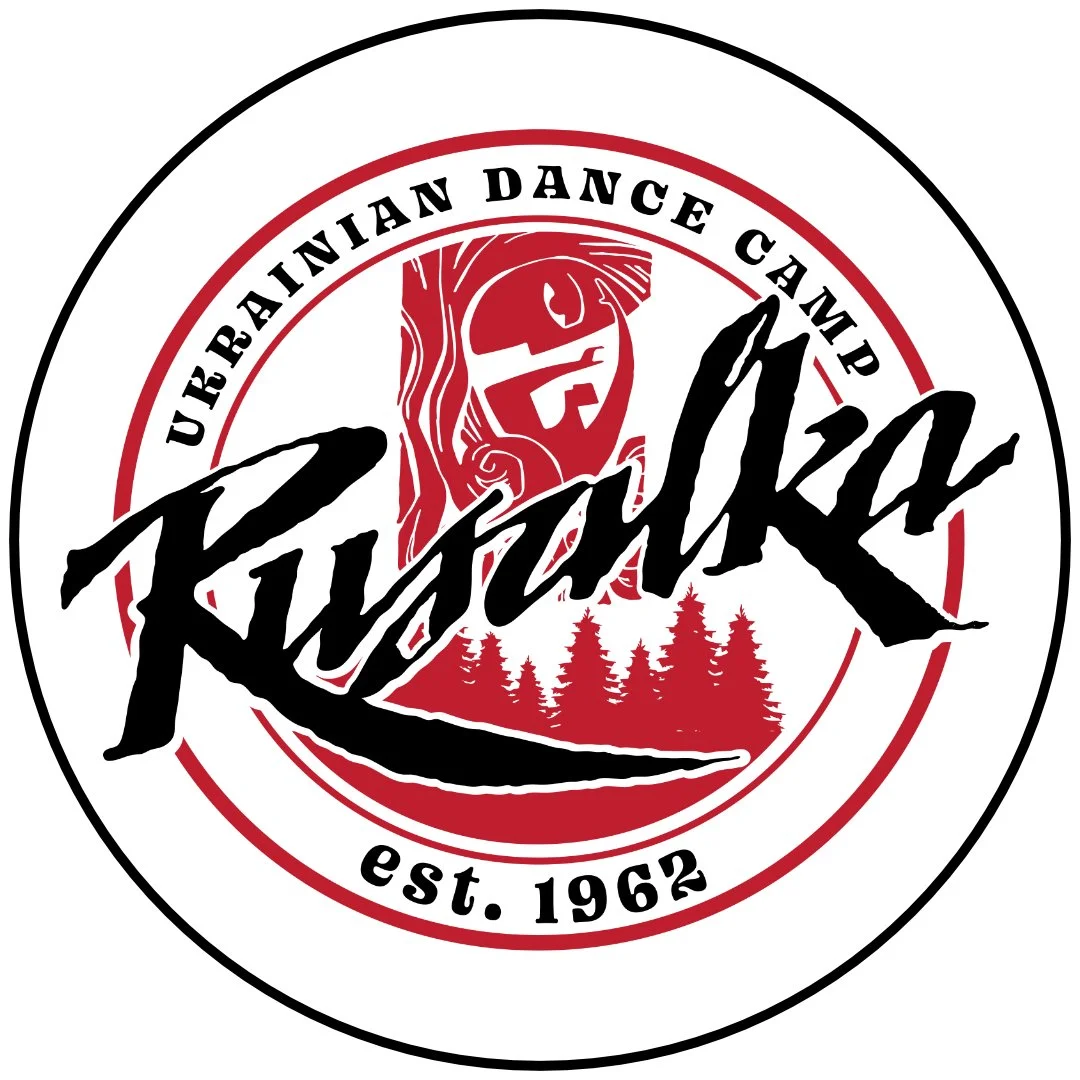 Logo of the Ukrainian Dance Camp Rusalko, established in 1962, featuring a stylized face, trees, and the camp's name.