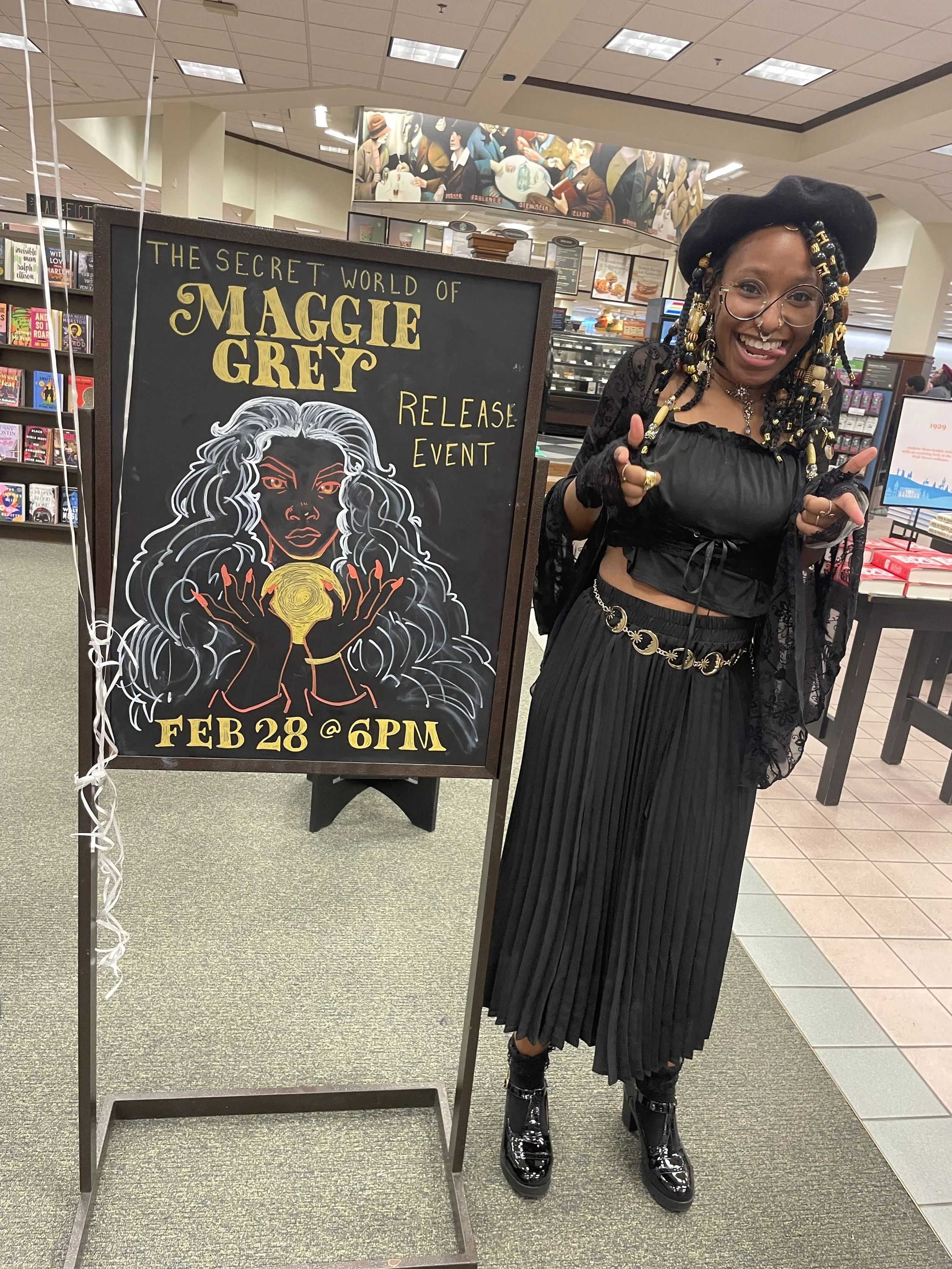 Afromuse Arts photographed at "The Secret World of Maggie Grey" book signing in cosplay.