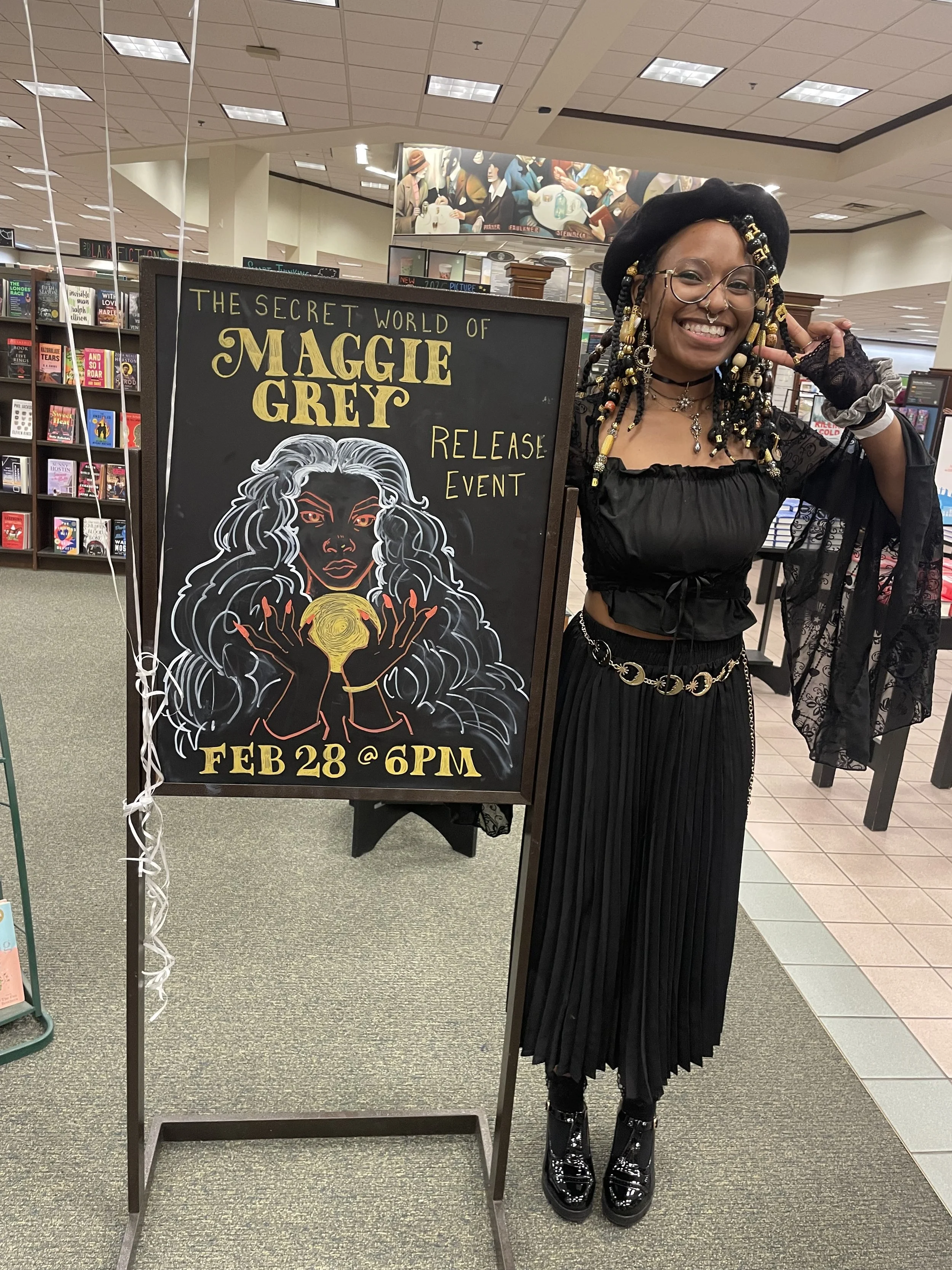 Afromuse Arts photographed at "The Secret World of Maggie Grey" book signing in cosplay.
