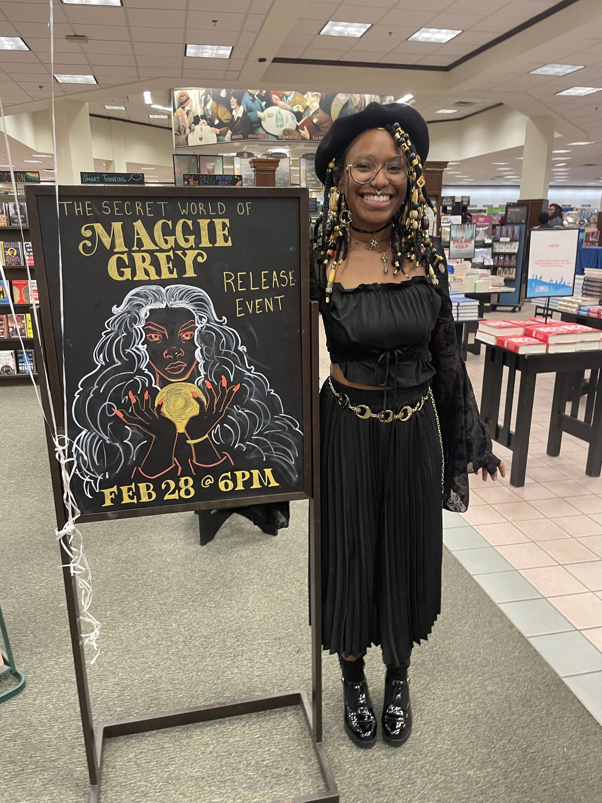 Afromuse Arts photographed at "The Secret World of Maggie Grey" book signing in cosplay.
