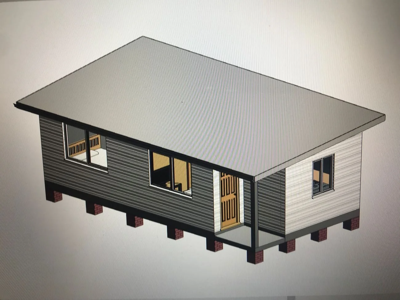 A digital rendering of a small, elevated granny flat with gray and beige siding, a large flat roof, brick foundation supports, and multiple windows including a sliding glass door.
