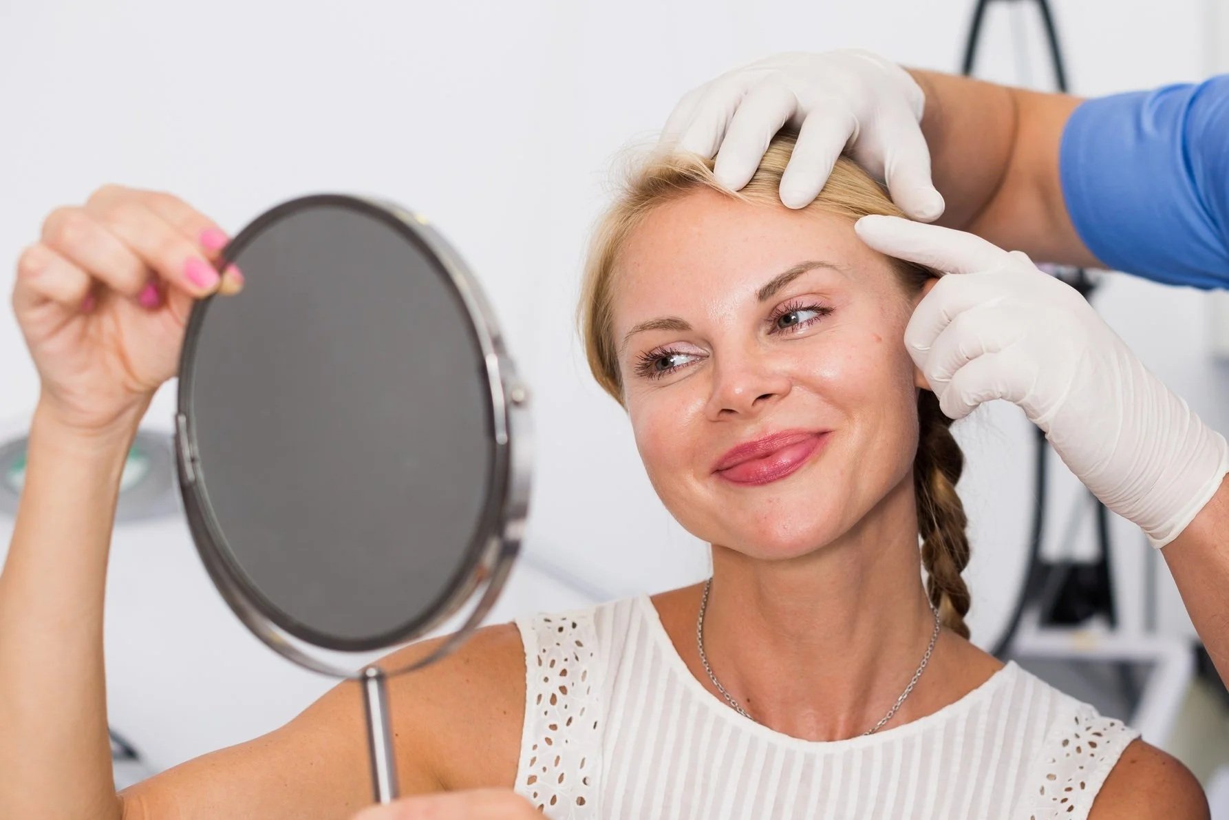 girl looking in mirror