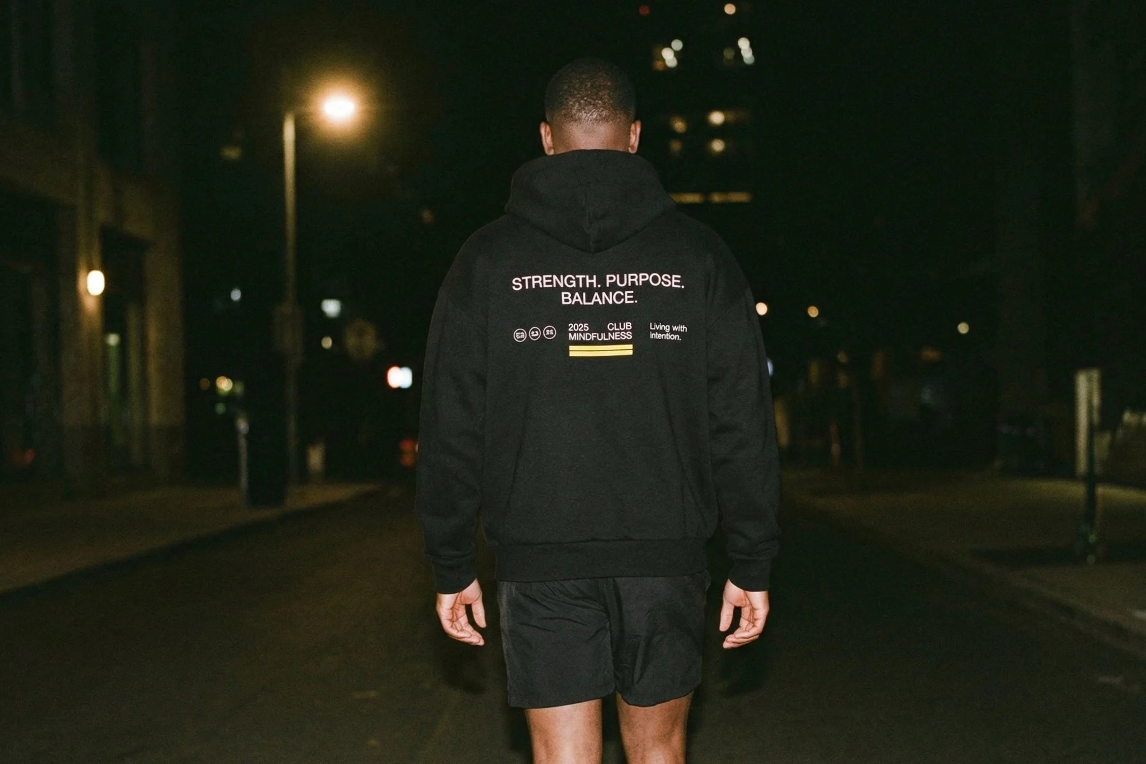 freepik_photorealistic-lifestyle-fashion-shot-in-the-style-of-premium-running-clubs-and-athletic-streetwear-campaigns.-img1-img2-img3-img4-scene-a-single-athletic-male-model-walking-away-from-cam_0001.jpg