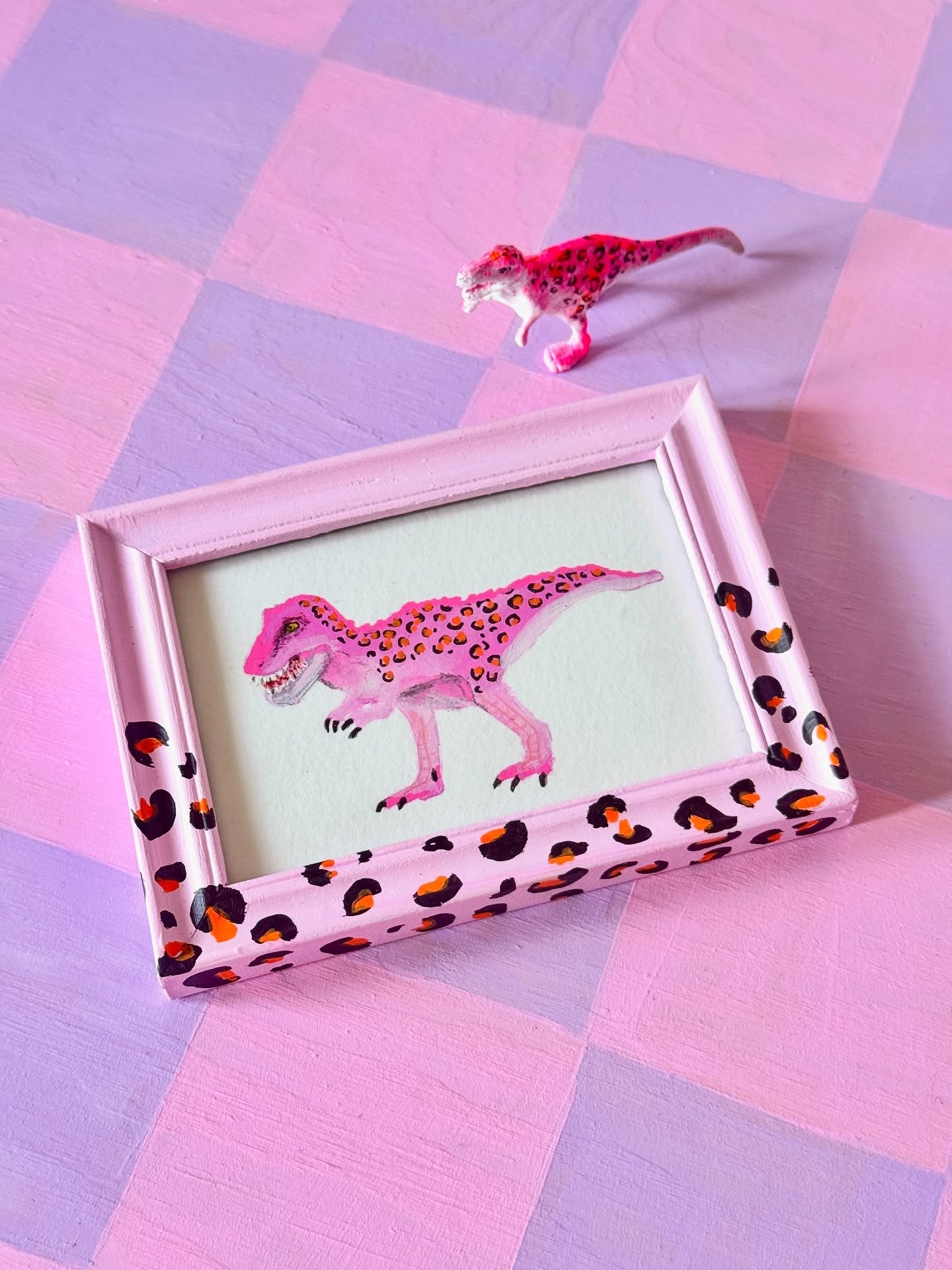 RAWR xD

Being obsessed with trinkets is not enough. I need trinket art from my trinkets. This is a very special little dinosaur that travelled across the country to live happily ever after with @mila.lue 🦖 
#rawrxd #trex #trinket #dinosaurart