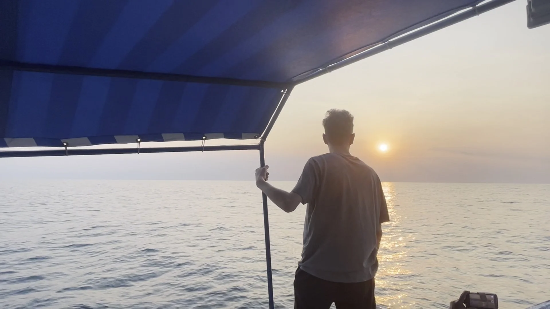 matt on the wanderer with the sunset.jpg