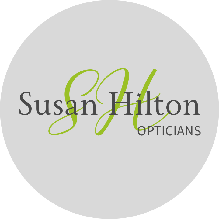 Logo for Susan Hilton Opticians with elegant black and gray text on a light gray background.