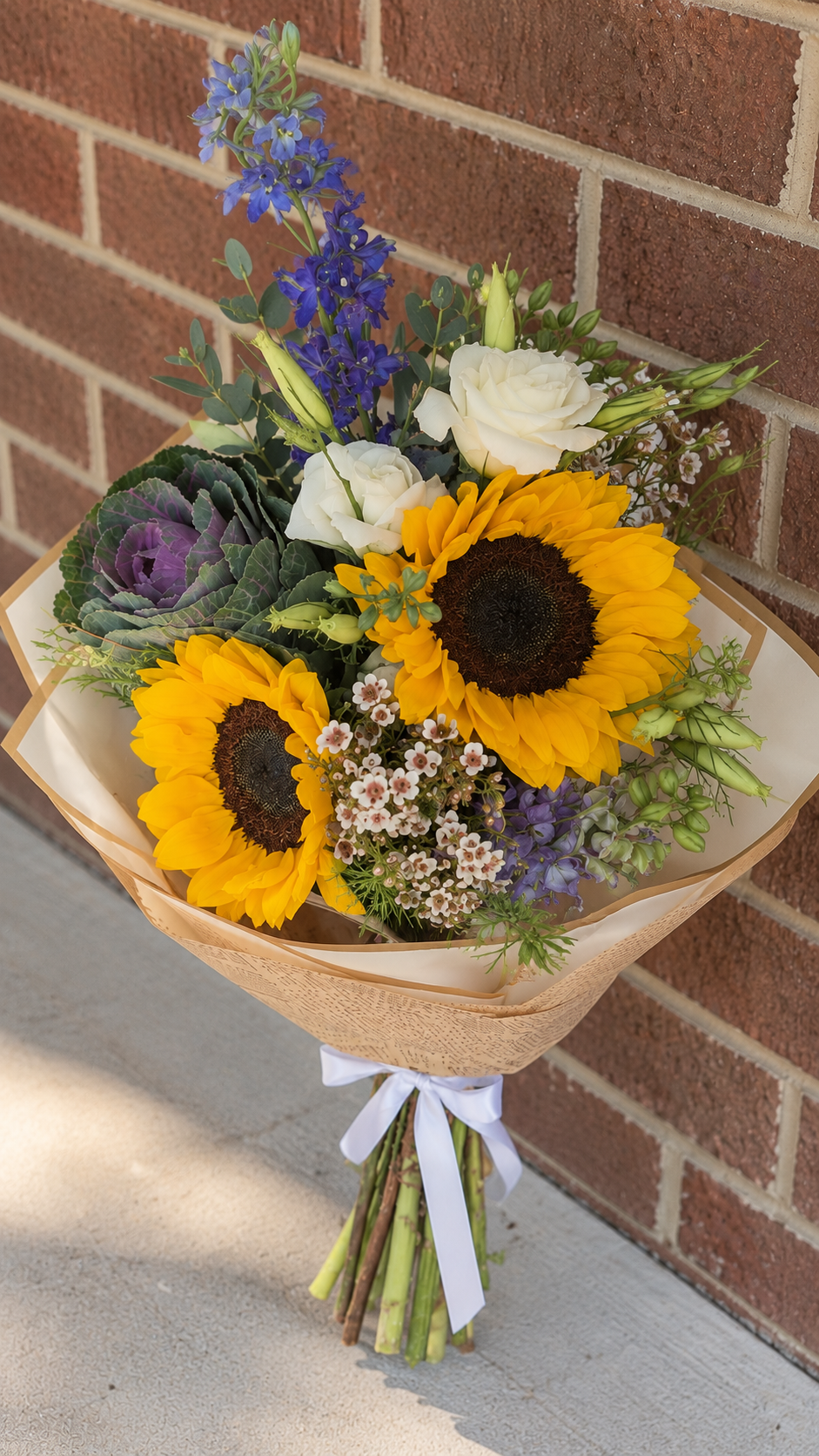 Sunflower Bouquet by the Brick Wall.png