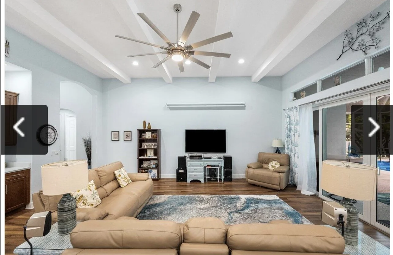 After Livingroom image moved furniture to balance the room. Flanked Lights on either side of coach and took out additional seating to give more open feel.
By simply moving a few things around it can make a big impact on the feel of the space. I did