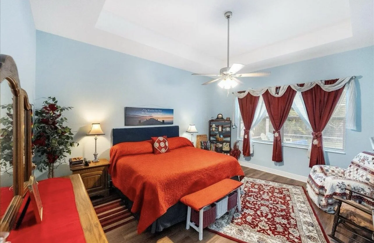 Changed window treatments and bedding for a more cohesive feel.