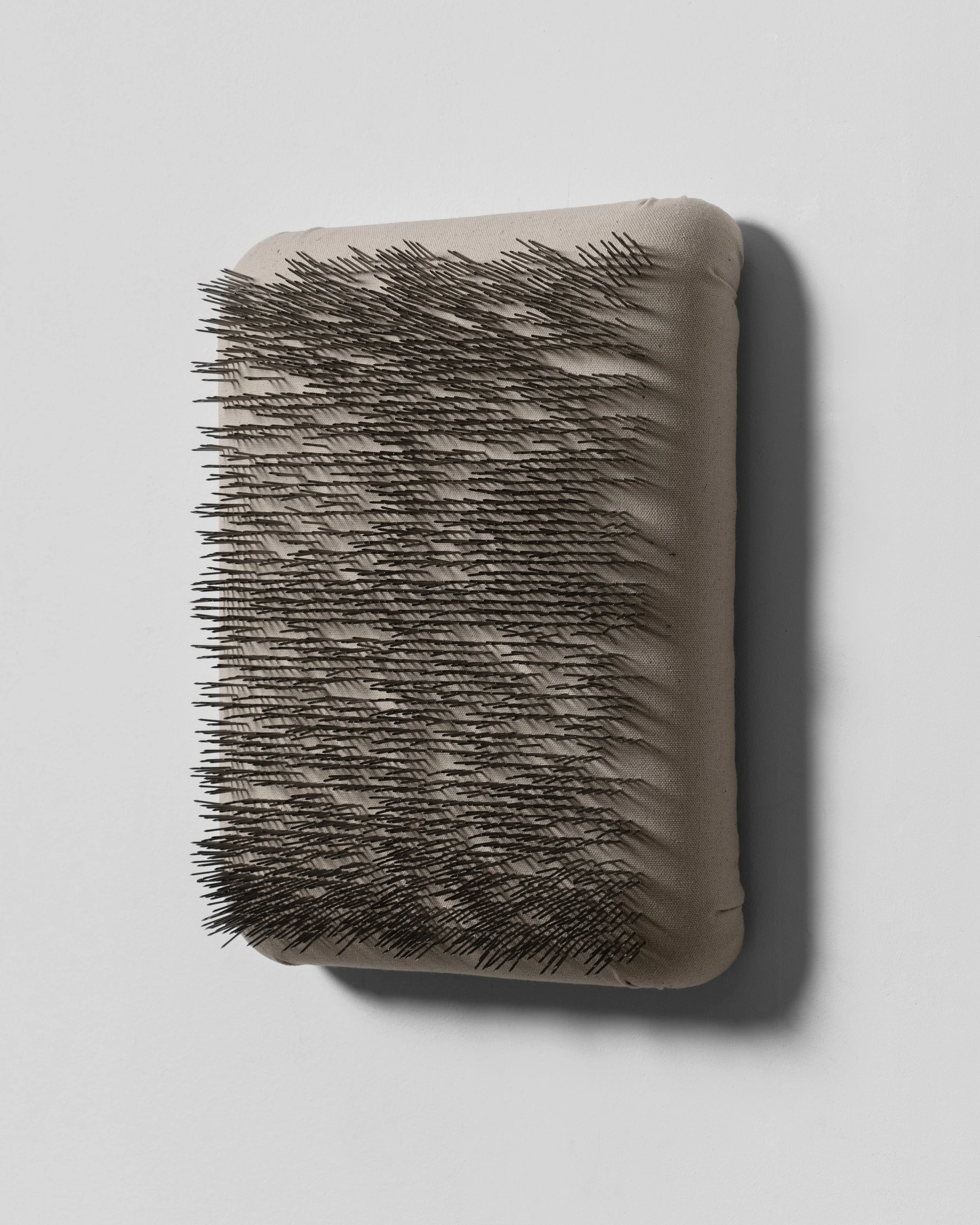 Nikolay Morgunov // n.67-m.c , 2025 // Canvas, foam, ink, nails, mixed media // 36x28 cm