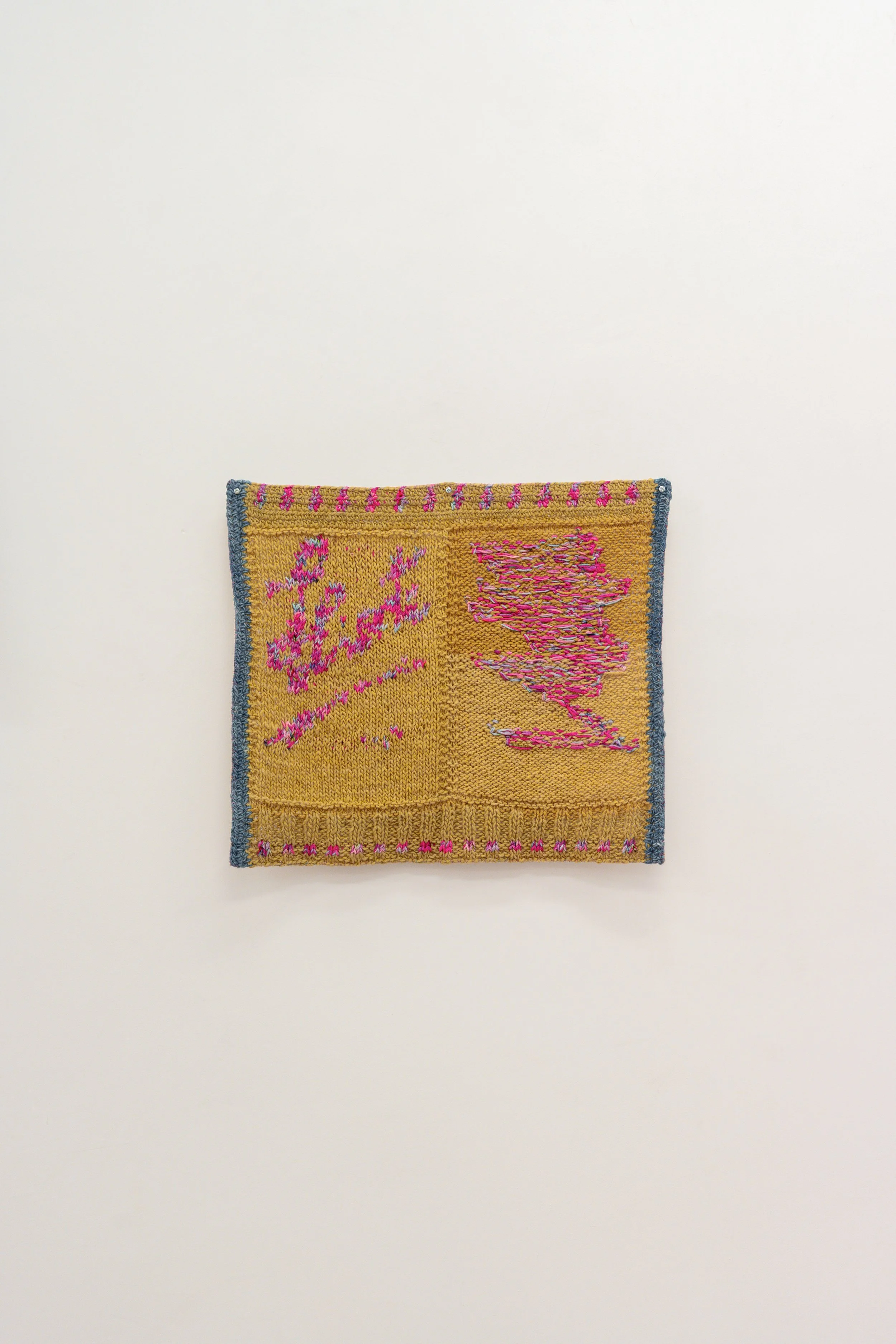 Firma en espejo, 2026 // Wool, burlap and steel eyelets (Knitting and crochet. Hand-sewn)  // 54 x 64 x 3 cm