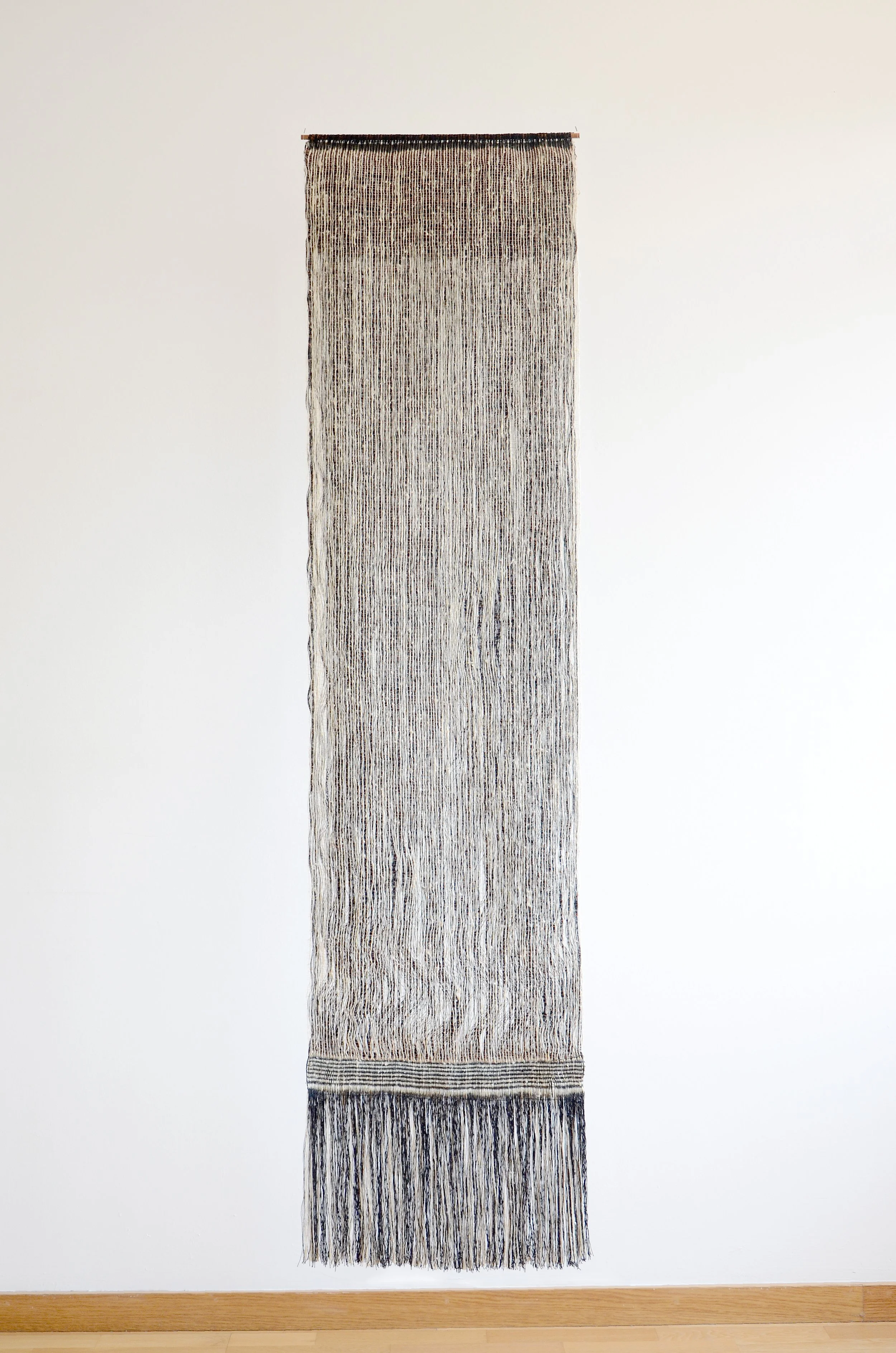 Luis Renteria // Polilla, 2025 // 
Silk, linen, copper thread. Woven by hand on a pedal loom // 175 x 43 cm