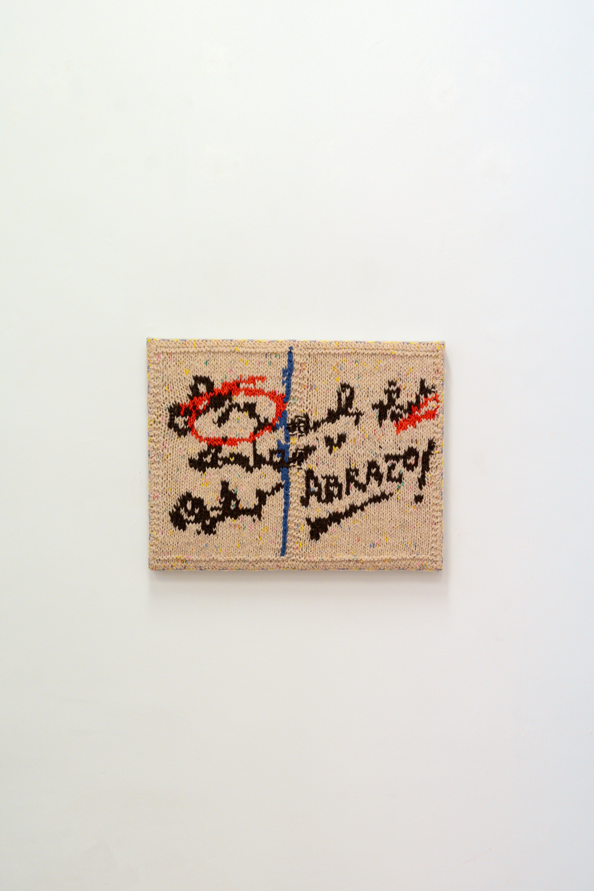 Abrazo, 2026 // Wool, fabric and wooden stretchener (Knitting and crochet) // 48 x 62 x 4 cm