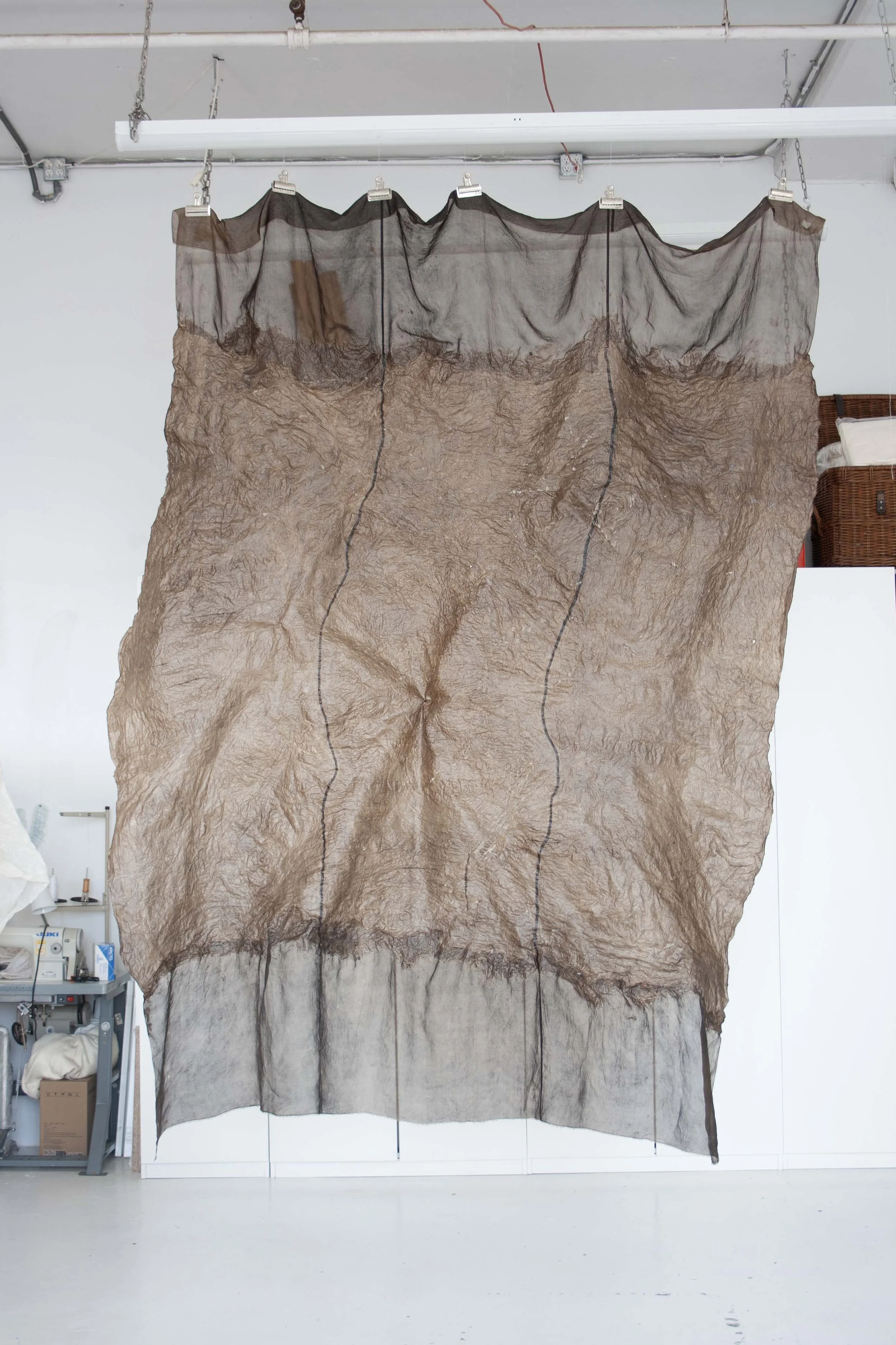 María Elena Pombo // Telurismos a Tres Tiempos (They Called it Mena'), 2024 // Large-Scale Sculpture, Venezuelan Petroleum, Corn Starch, Glycerine, Vinegar, Deadstock Silk Organza // 3,1 x 2,1 m