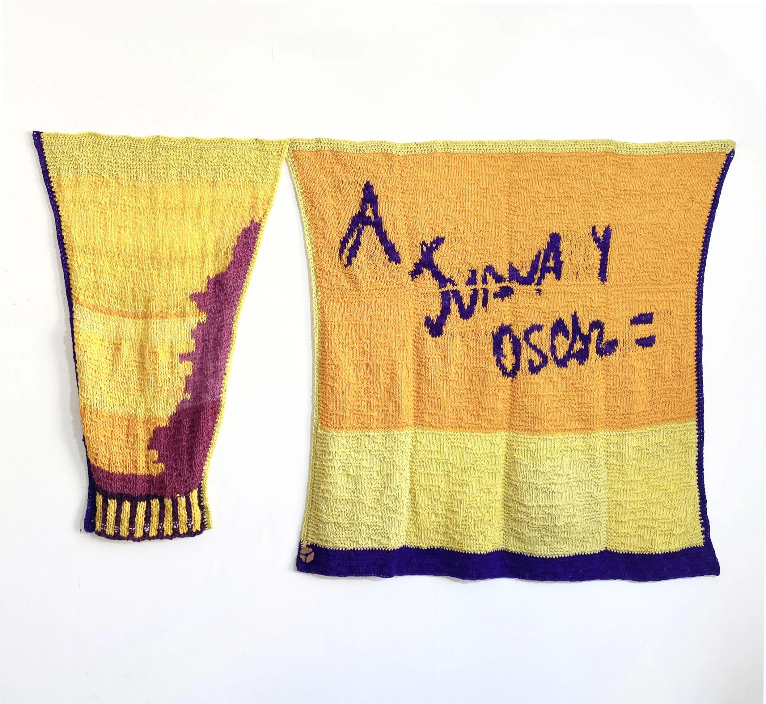 A Juana y Oscar (Dos piezas), 2026 // Sheep's wool (Hand-knitted with two needles and crochet) // Total dimensions: 134 x 215 x 3 cm Dimensions of the left piece: 120 x 77 x 3 cm Dimensions of the right piece: 134 x 138 x 3 cm