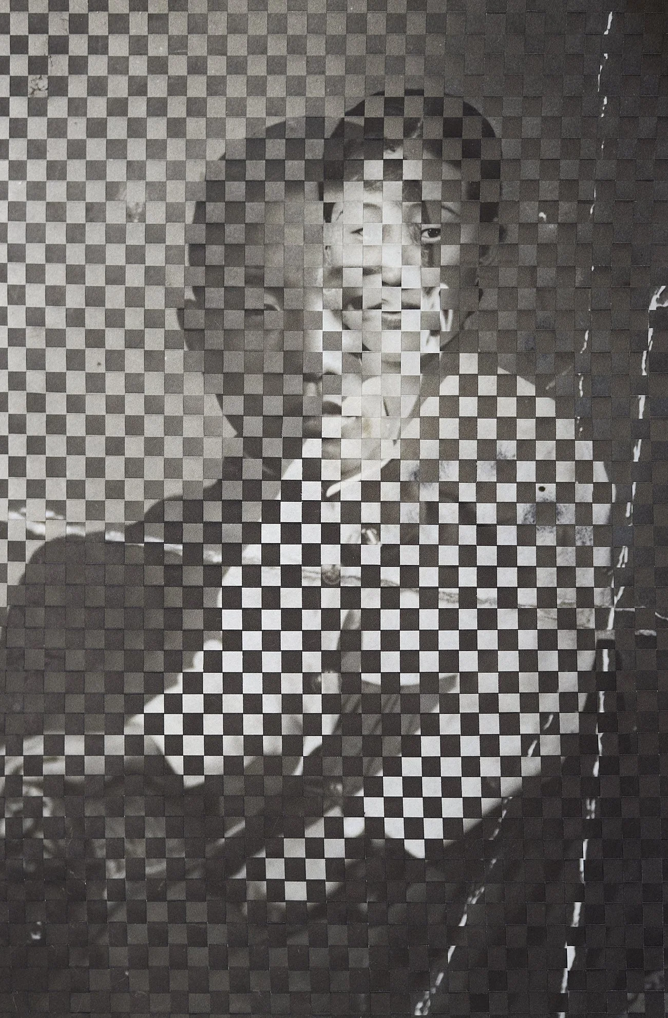 Tejiendo el Origen (Weaving the Origin), 2025 // Two inkjet prints on mulberry paper, hand - woven // 53 x 37 cm 