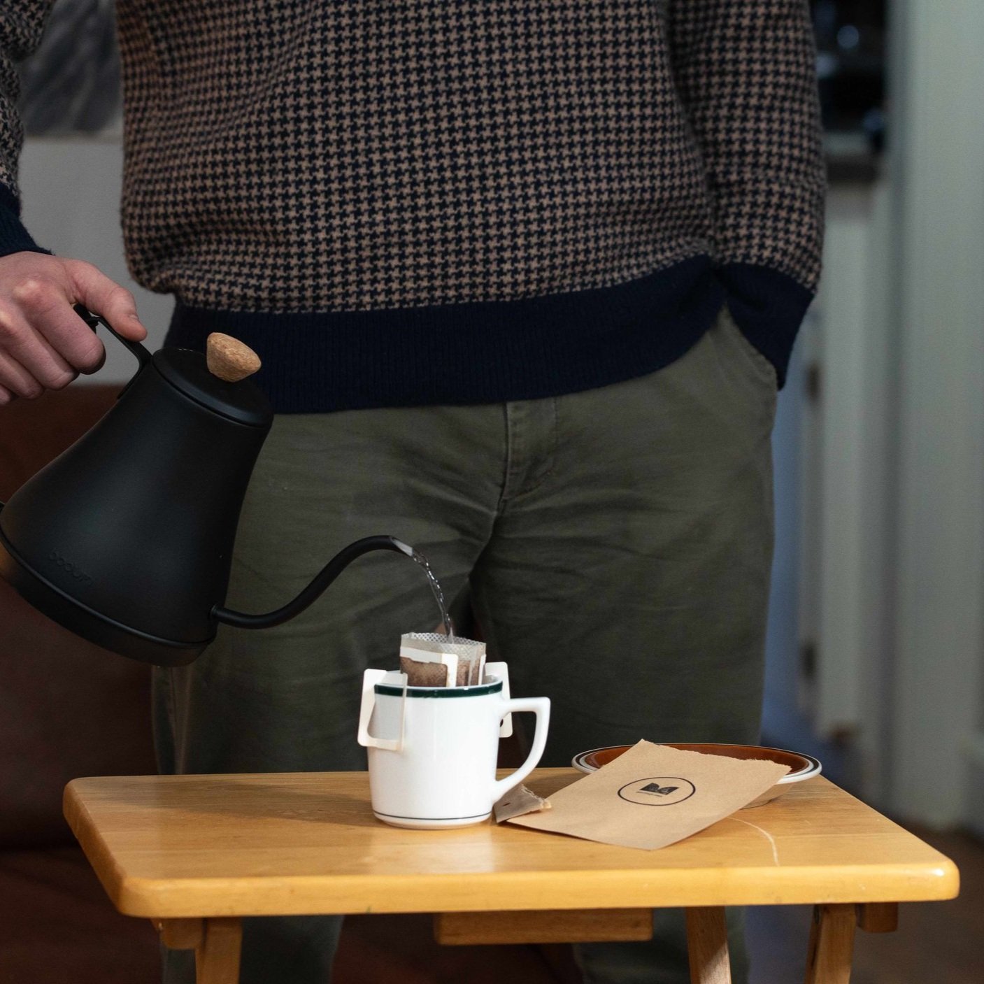 Person standing behind MOJO and pouring into it (Copy)