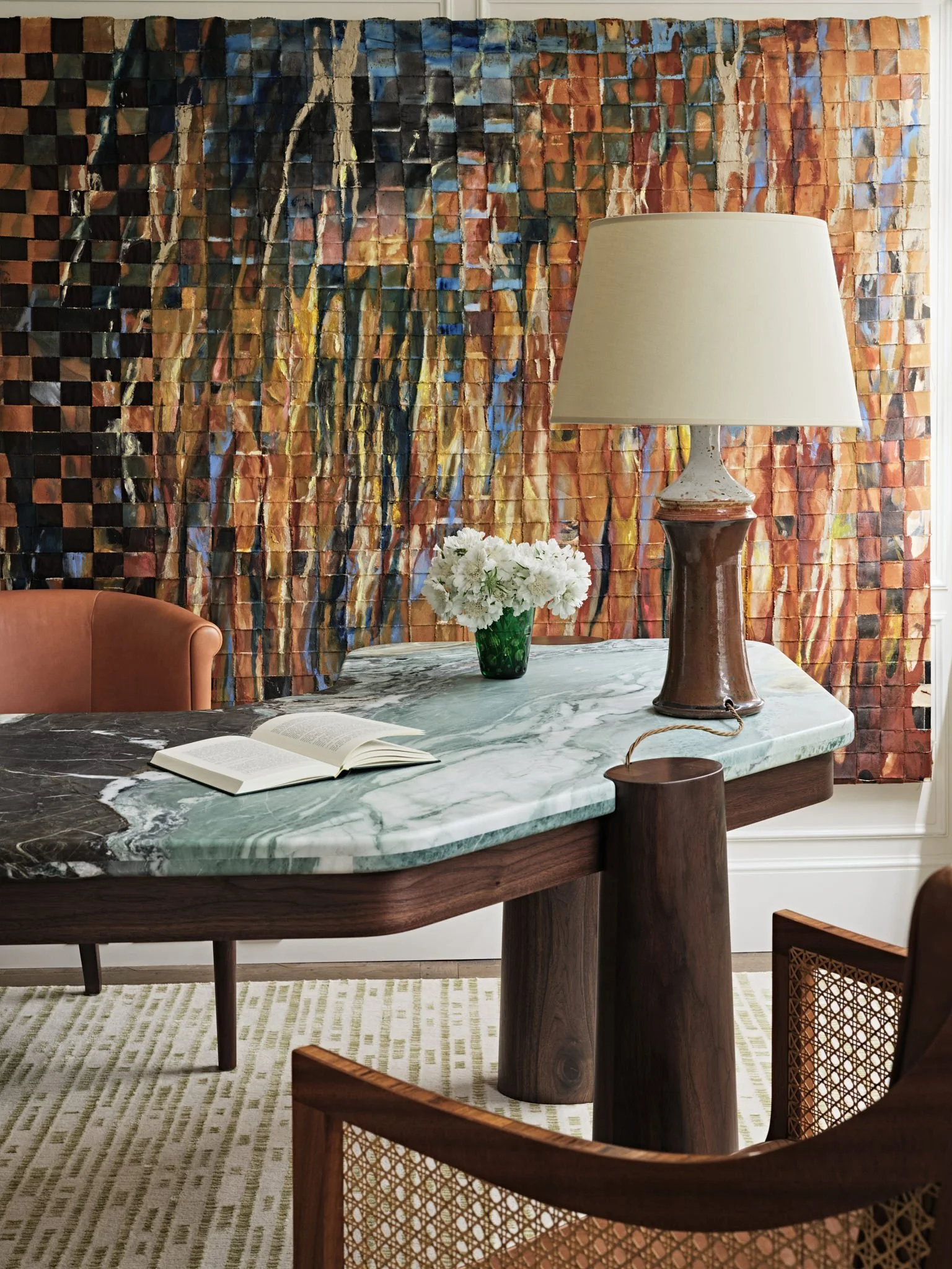 Marble topped desk in tasteful home office with abstract artwork, interior design by Bryan O'Sullivan Studio
