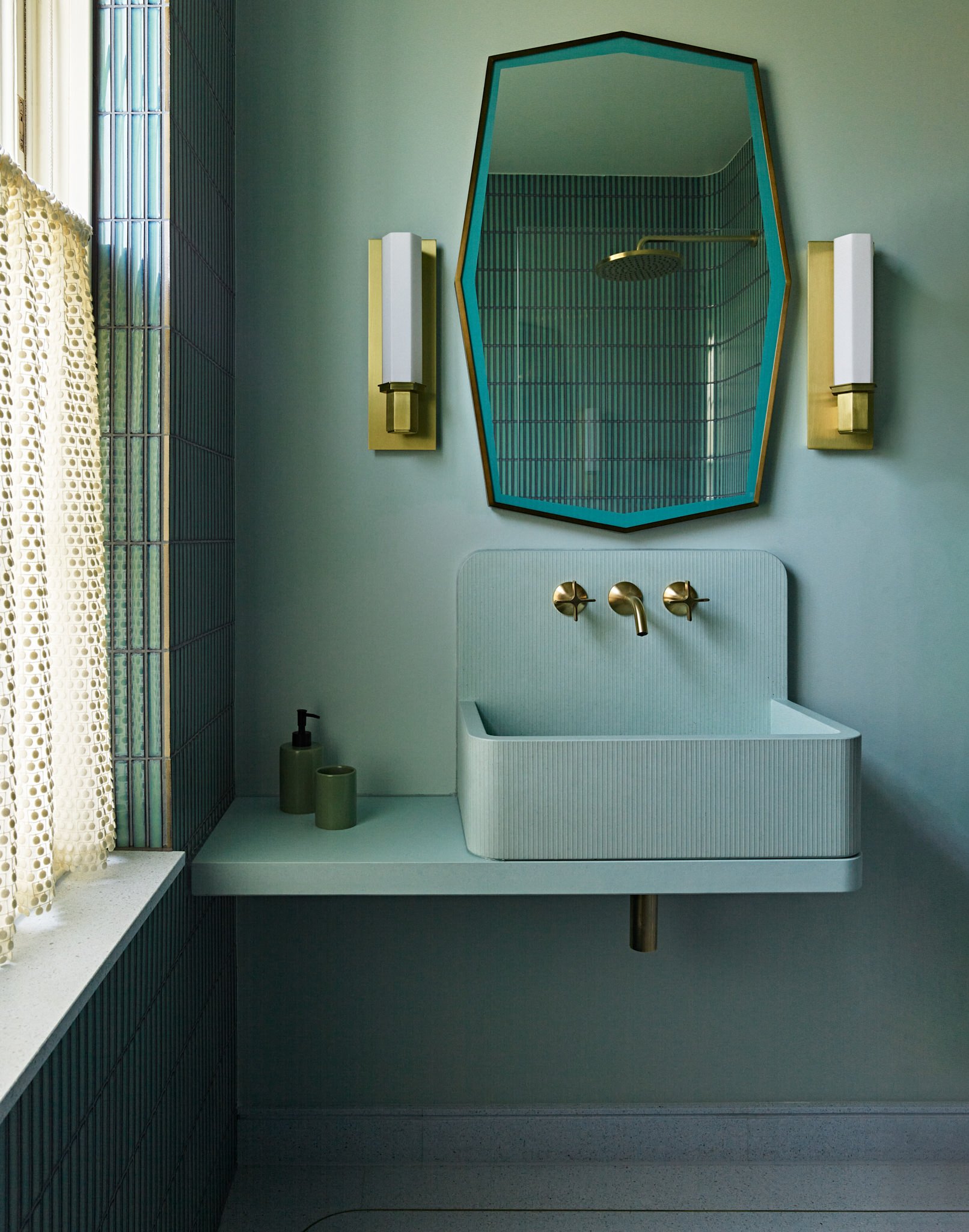 Green bathroom with kast concrete basin
