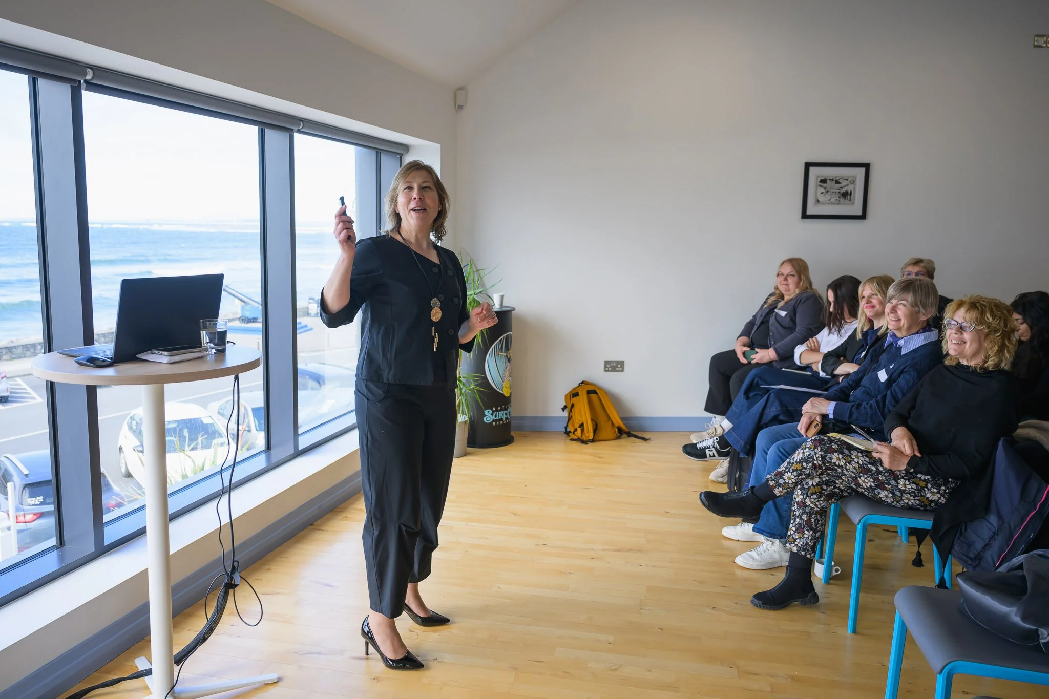 Speaker presenting to delegates at the National Surf Centre, Strandhill, during the Western Development Commission REWARD conference