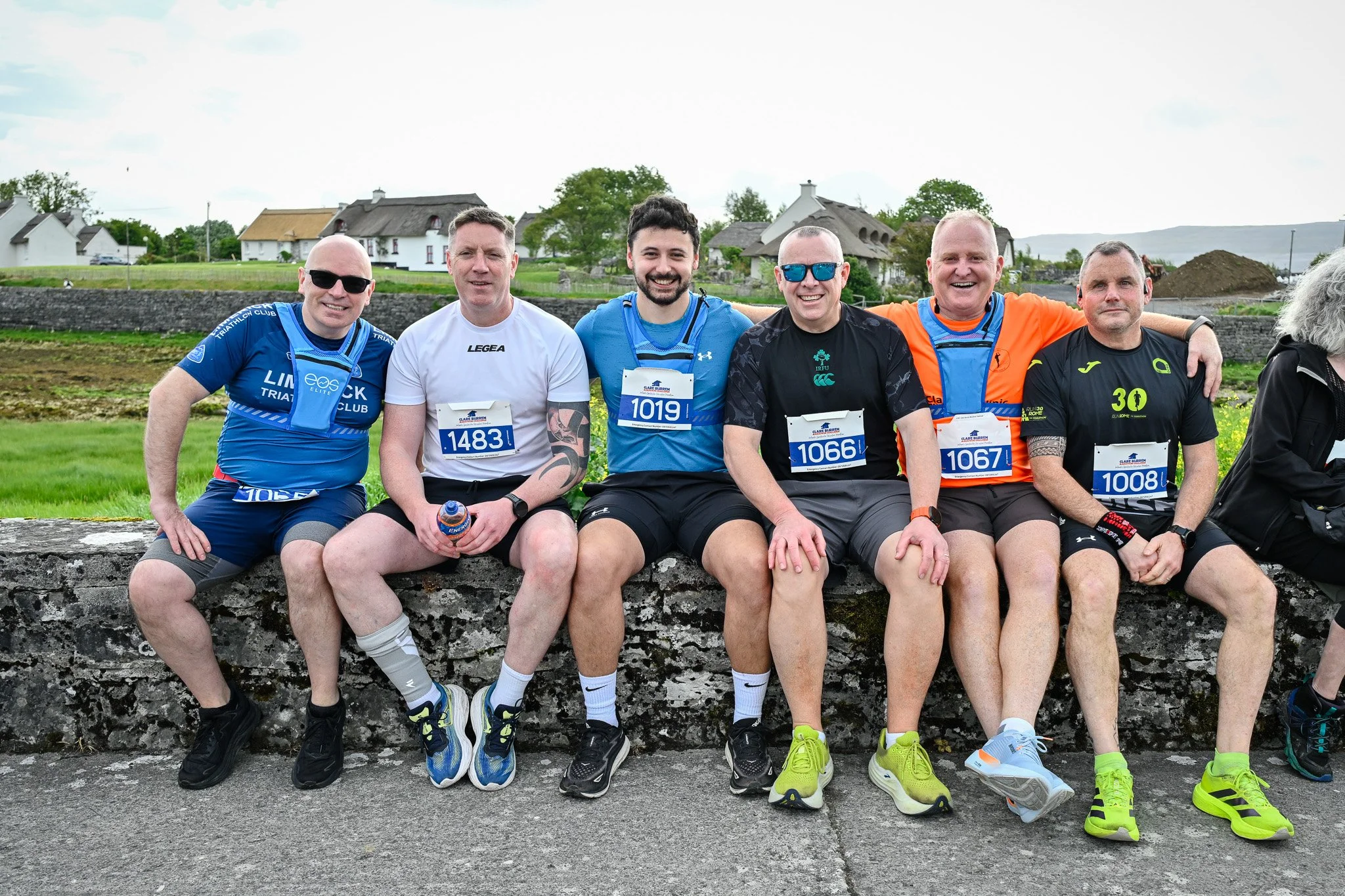 Friends posing together before the Clare Burren Marathon Challenge 2026 in Ballyvaughan