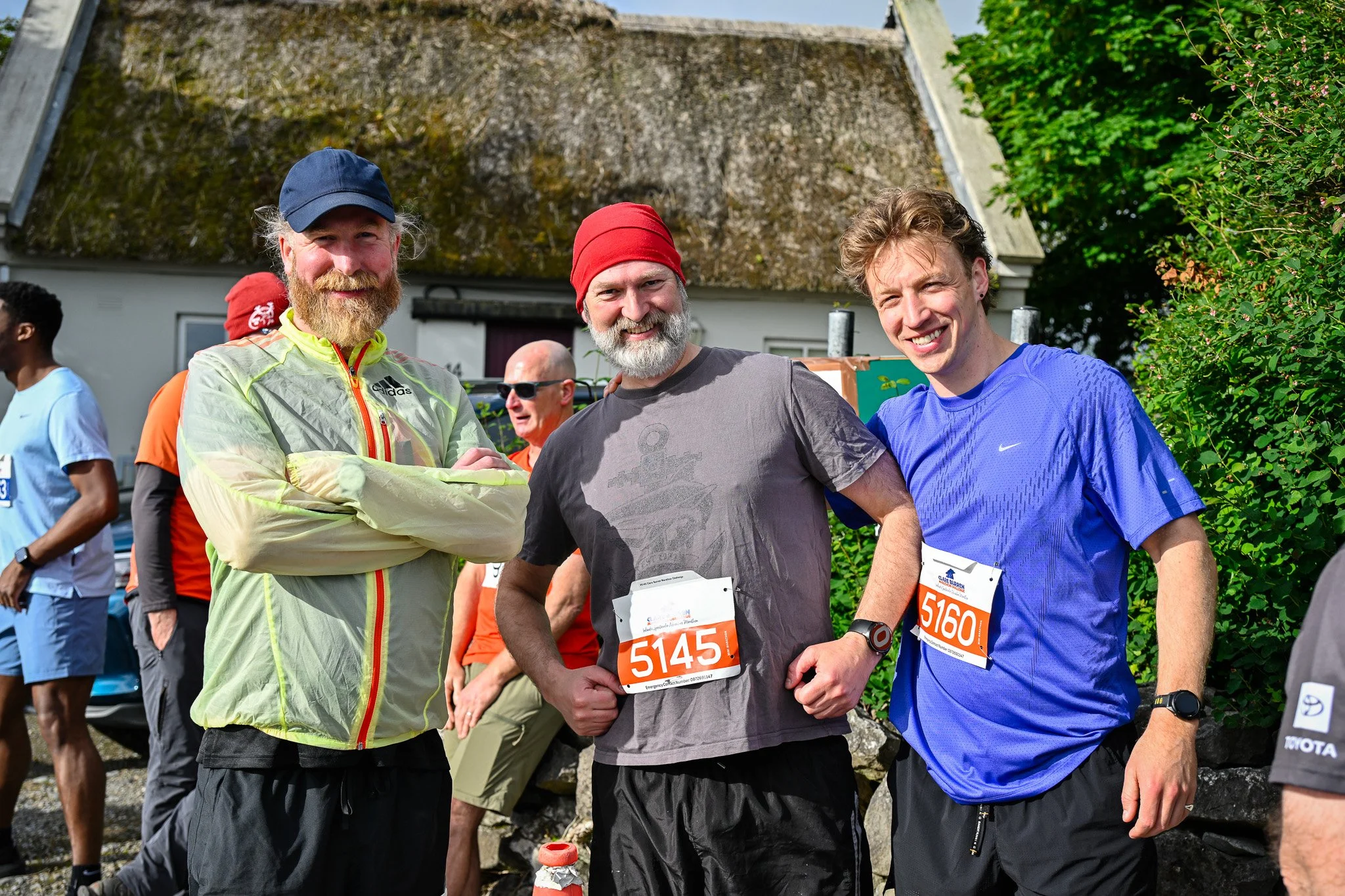 Friends posing together before the Clare Burren Marathon Challenge 2026 in Ballyvaughan