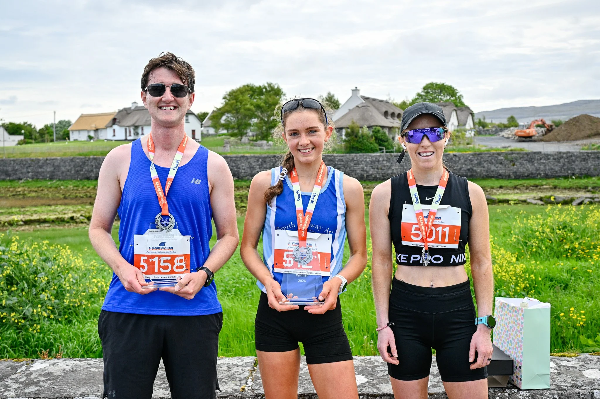 Happy runners celebrating after the finish at the Clare Burren Marathon Challenge 2026 in Ballyvaughan