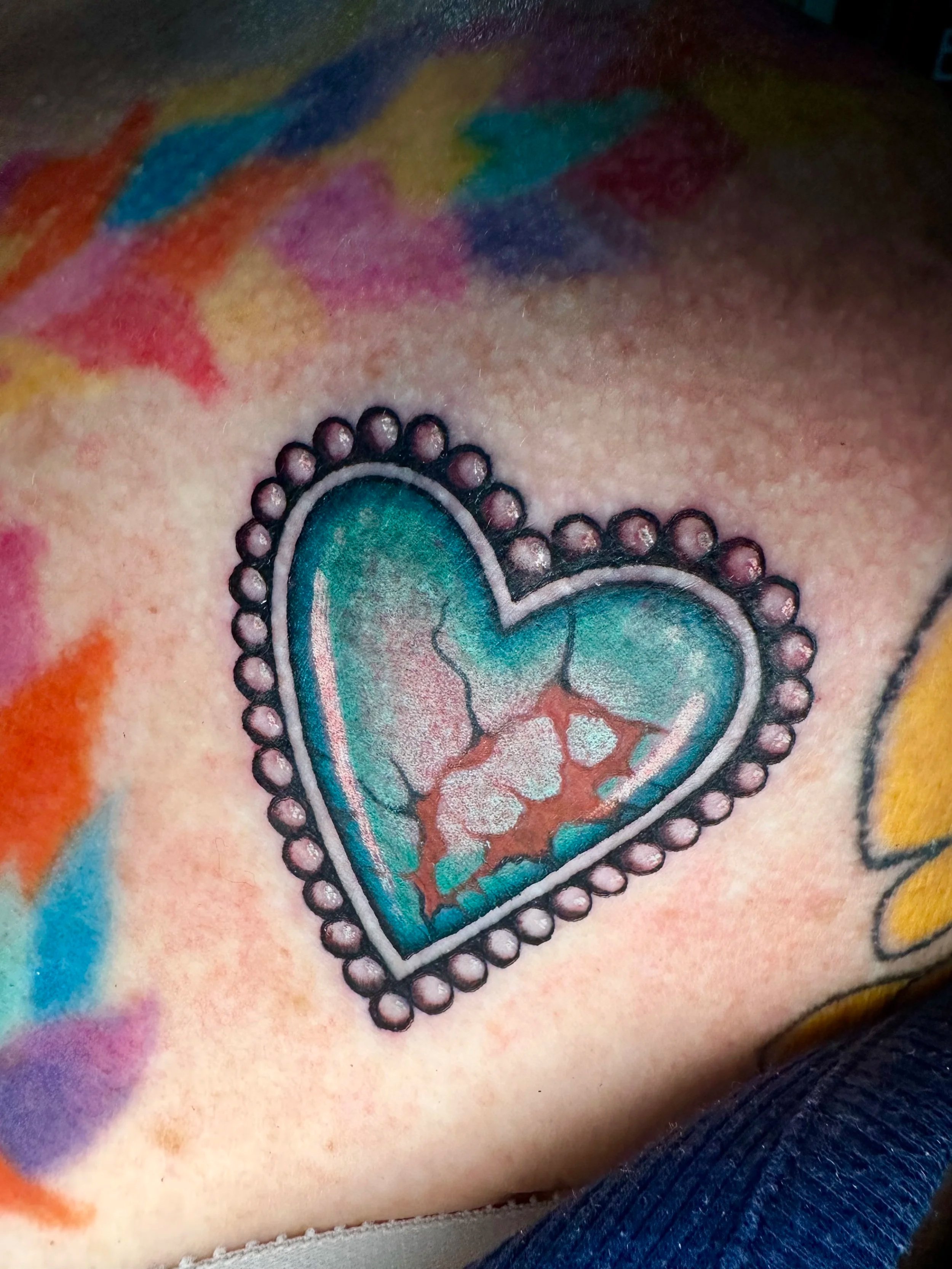 This was a first time client who saw some of my turquoise work on my instagram and decided she needed one too. She had a nice collection and I was very happy to add this tattoo to it.