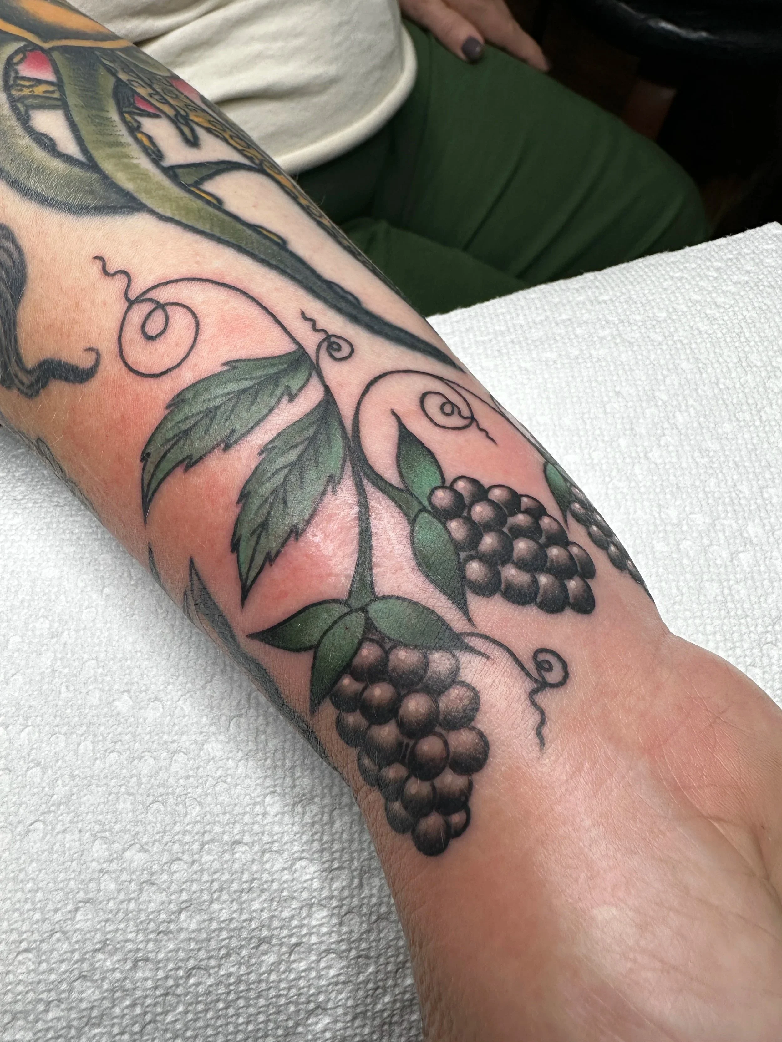 I made another similar blackberry tattoo for another client and this gal just loved it and wanted something similar. This was actually hand drawn on to fit the space. I love the movement and how well it sits inbetween her other tattoos.