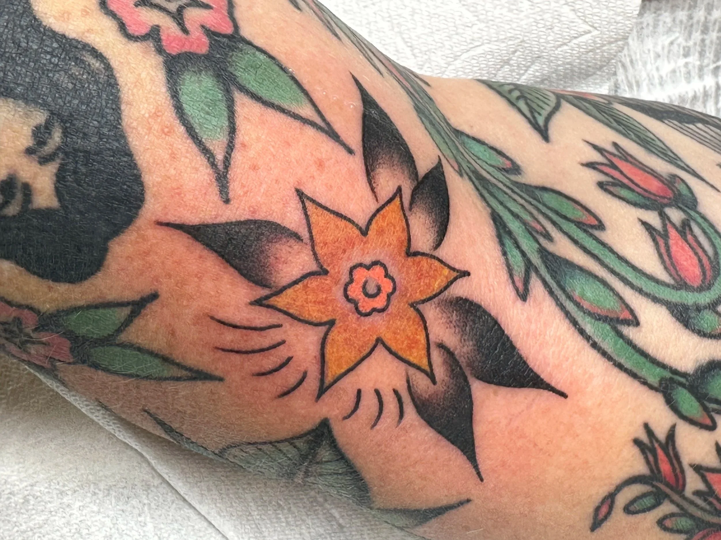 You know this girl. This is another filler flower we made to fill the gaps between tattoos. She is so cool and her taste shows!