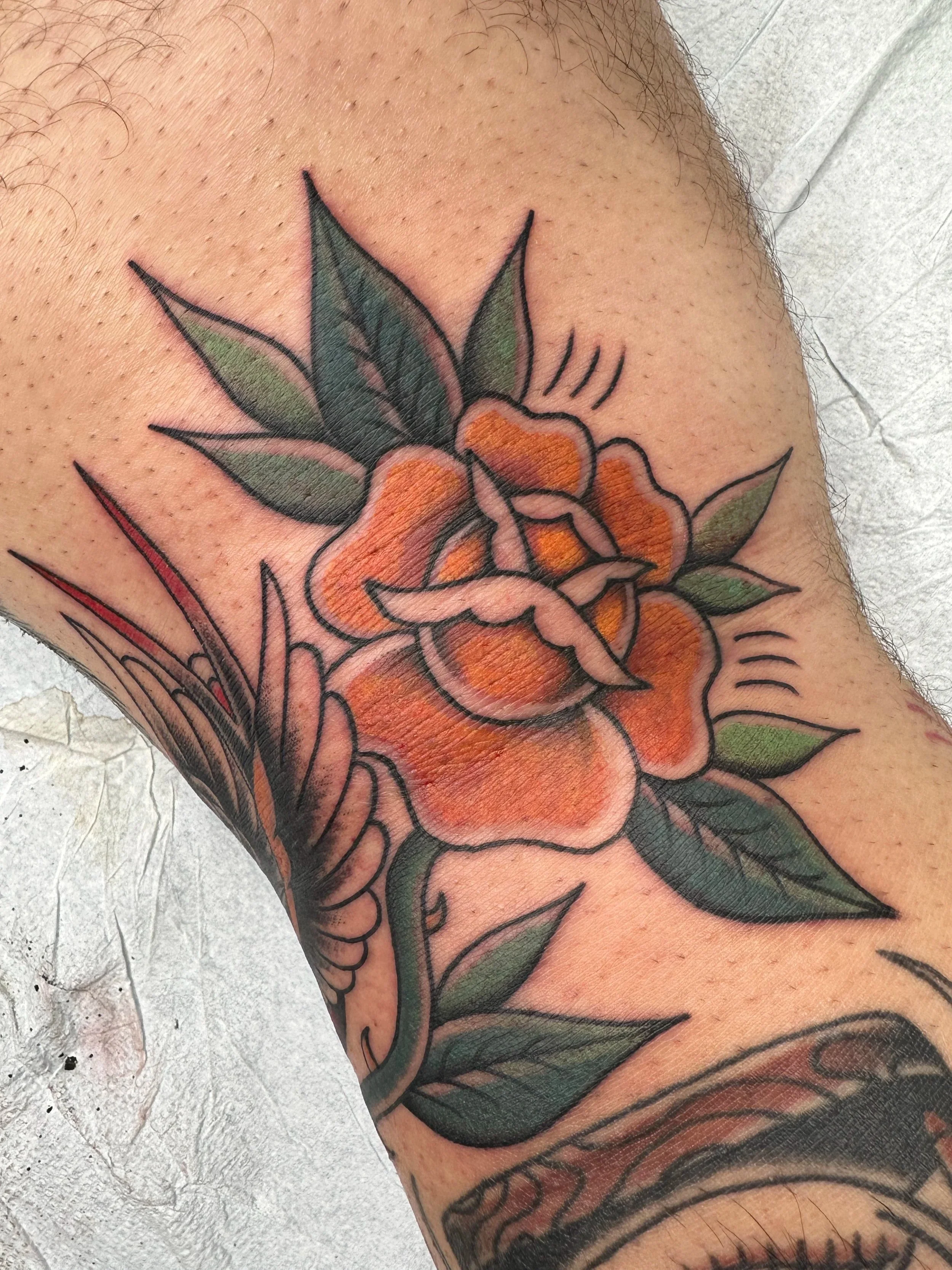 Drawn on rose and sparrow to fill the knee ditch. The space was large enough for a stencil, but we went ahead and made him something custom so it could really never be duplicated the same way.