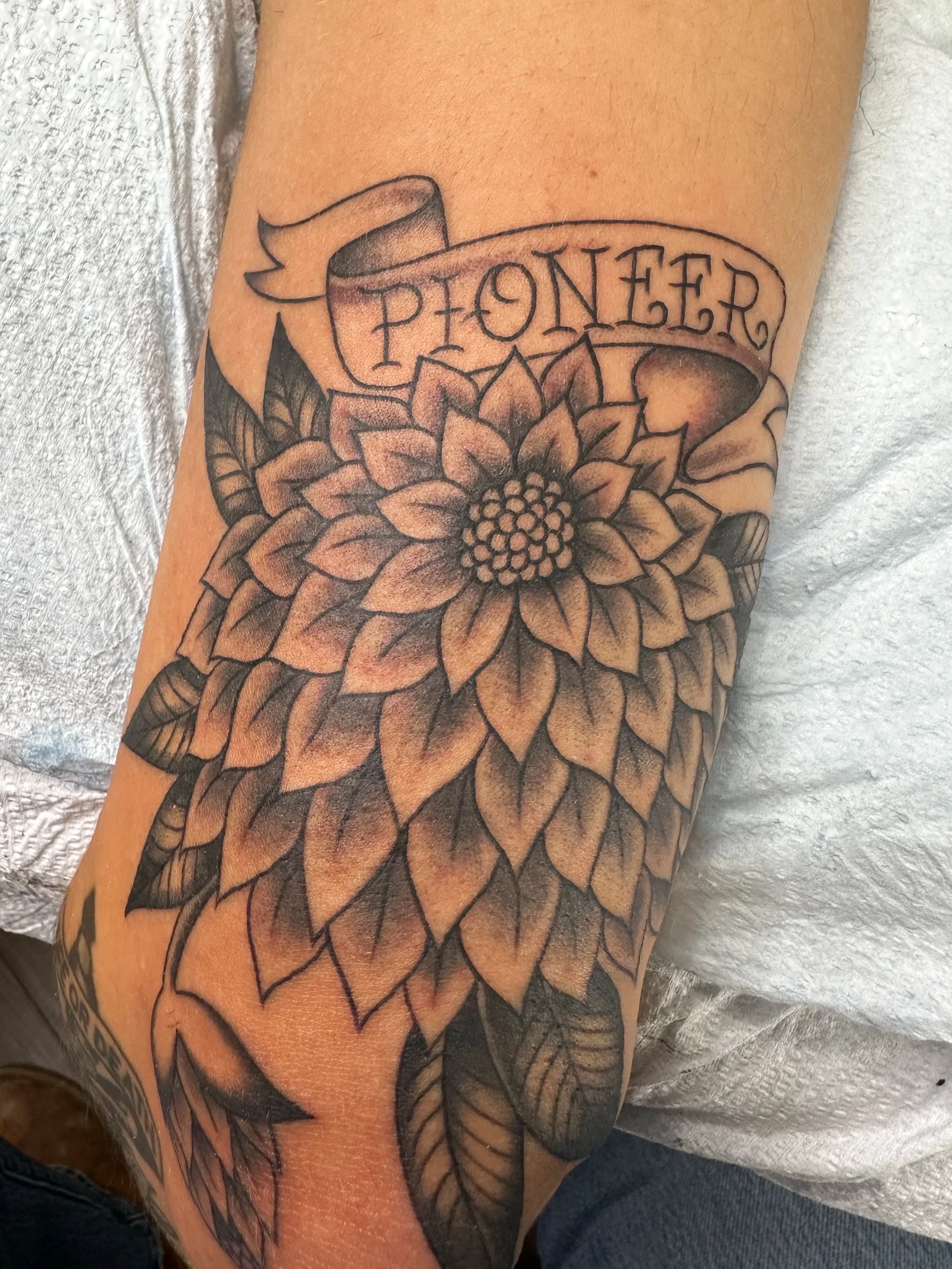 This black and grey flower is for my client’s grandmother who first moved to Tucson and eventually brought the whole family out to live