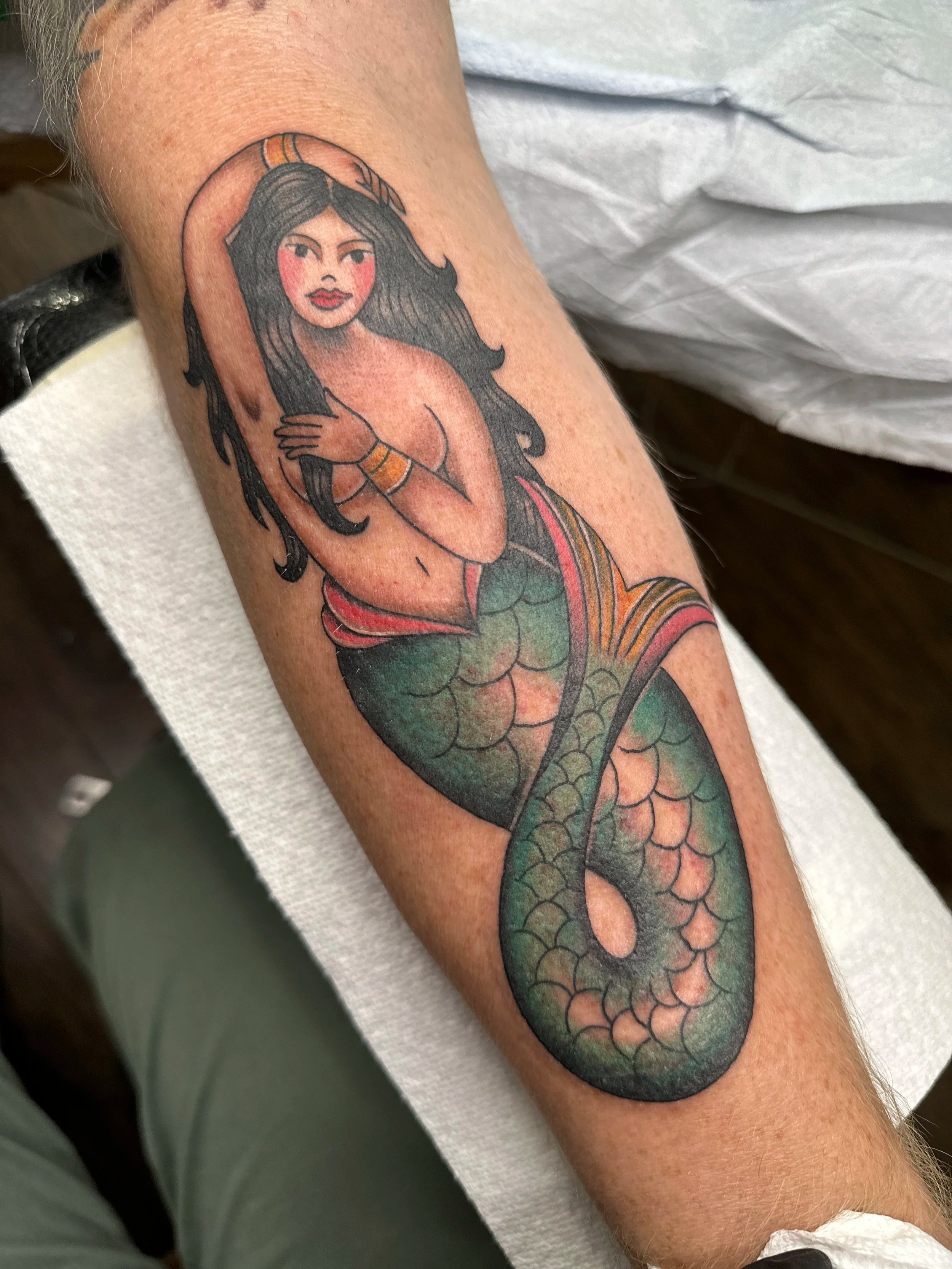 I love mermaids. They’re so fun to tattoo. I mean look at her? She’s modest but we’re ok with that. I can make them topless too, but that’s up to you.