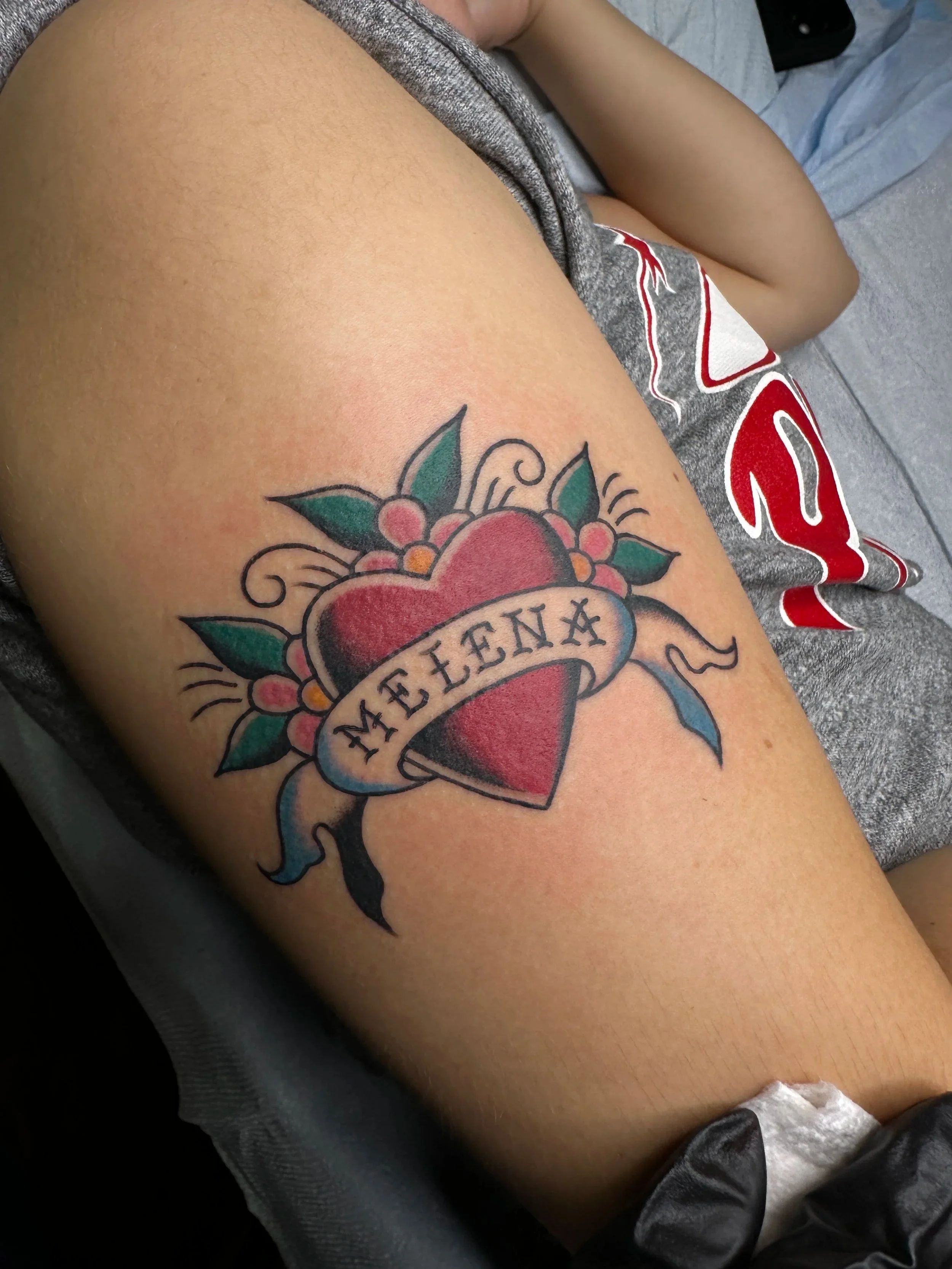 Matching tattoos for two wives. Very cute and classic