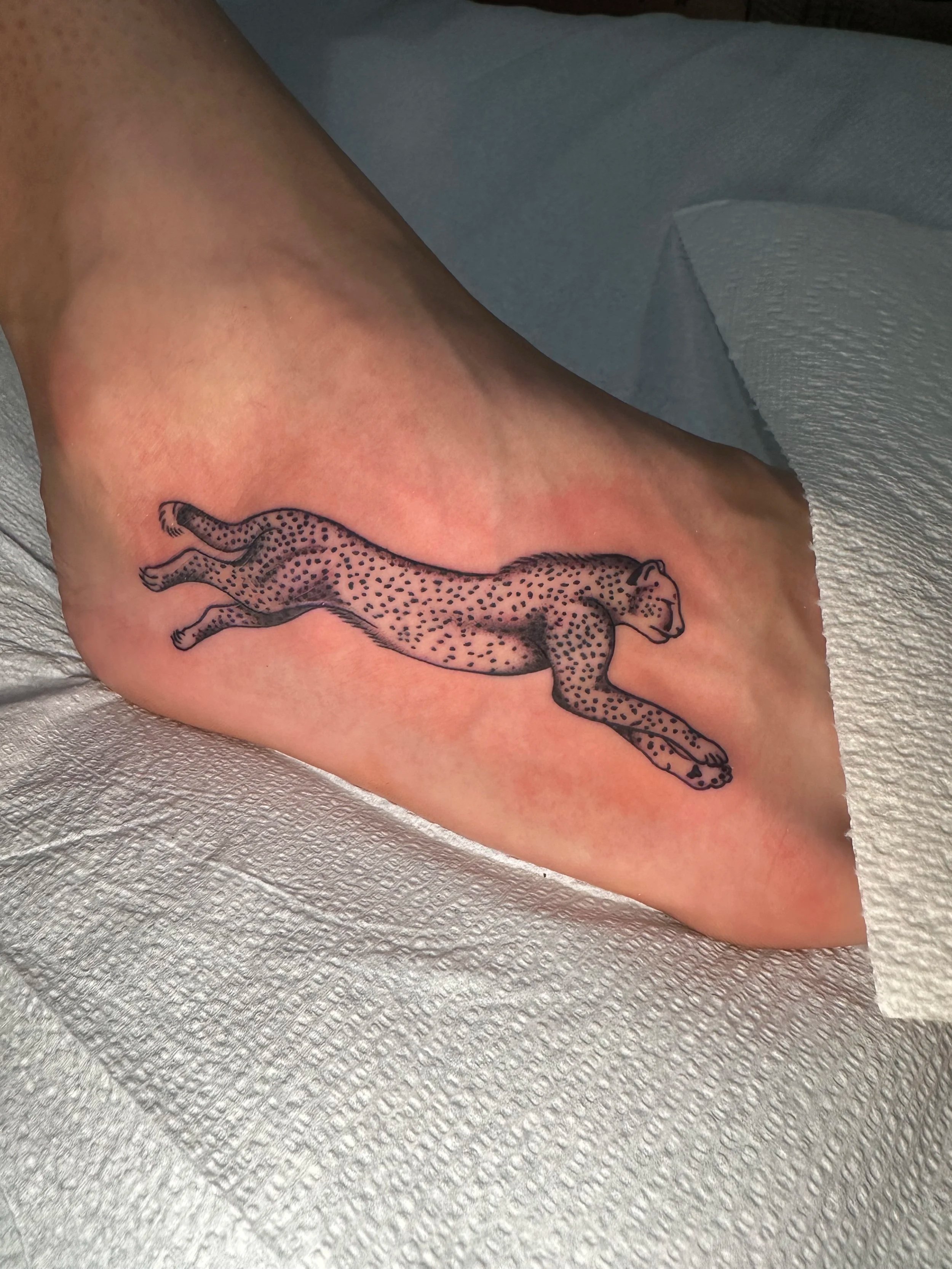 I made this cheetah tattoo from some custom flash I made for my friend’s women’s motorcycle gear company ATWYLD. So cool on a foot for my good client who rides bikes