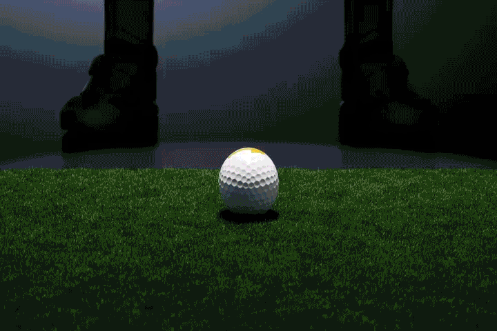 Golf ball and iron close-up on turf in Uneekor simulator video, showcasing advanced indoor golf technology for accuracy and training.