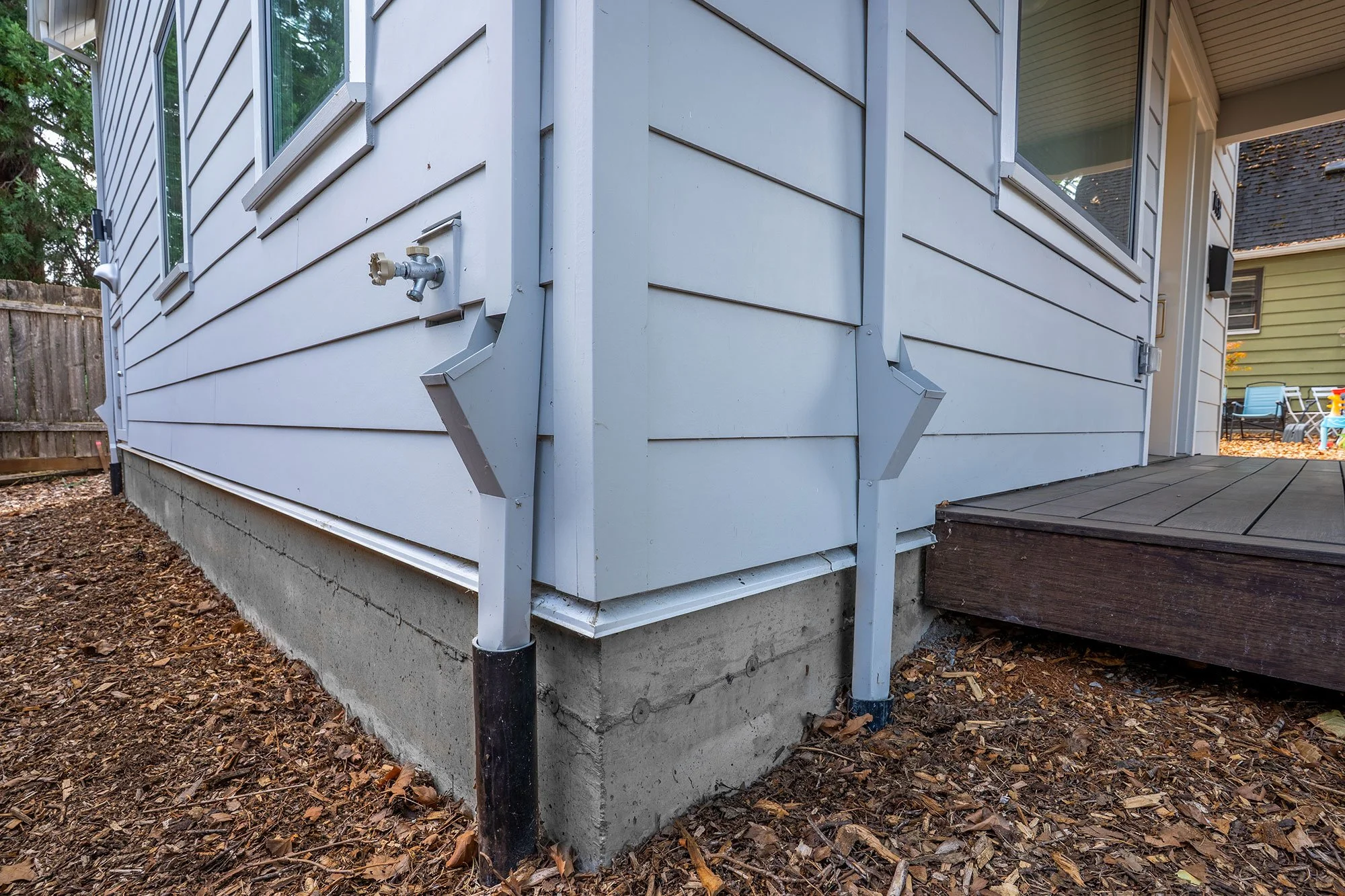 Concrete foundation with house built on top