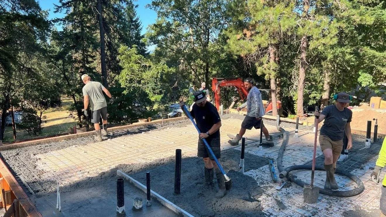 Low carbon green concrete foundation being placed at the Spring Street Passive House for Diane and Kristof Irwin