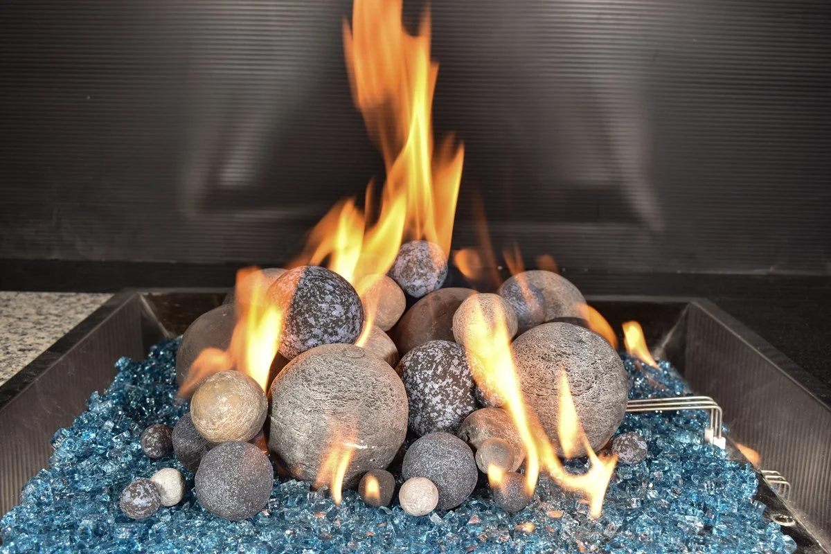 Fire stones on a crushed fire glass base