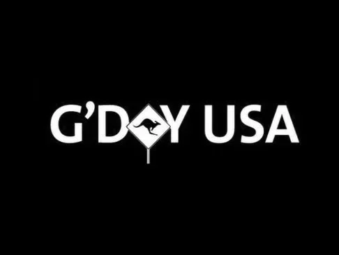 Logo with text 'G'DAY USA' in white letters on a black background, featuring a kangaroo silhouette inside a diamond shape replacing the letter 'A'.