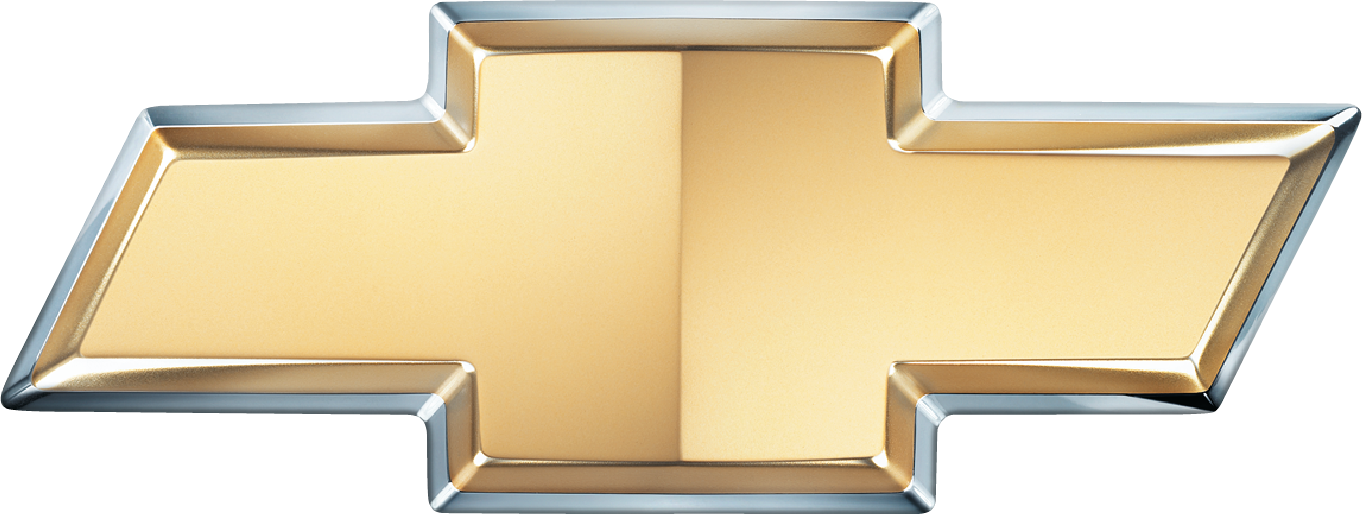A metallic gold and silver cross-shaped baking pan or mold.
