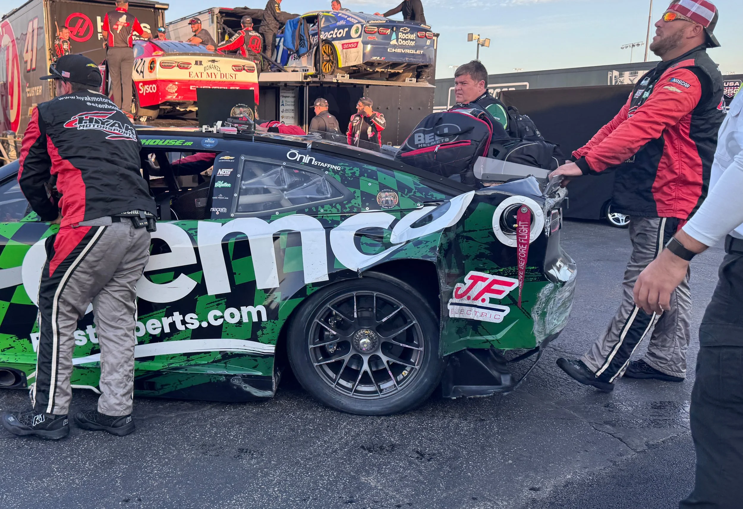 the Green Machine after the race showing damage on the back end