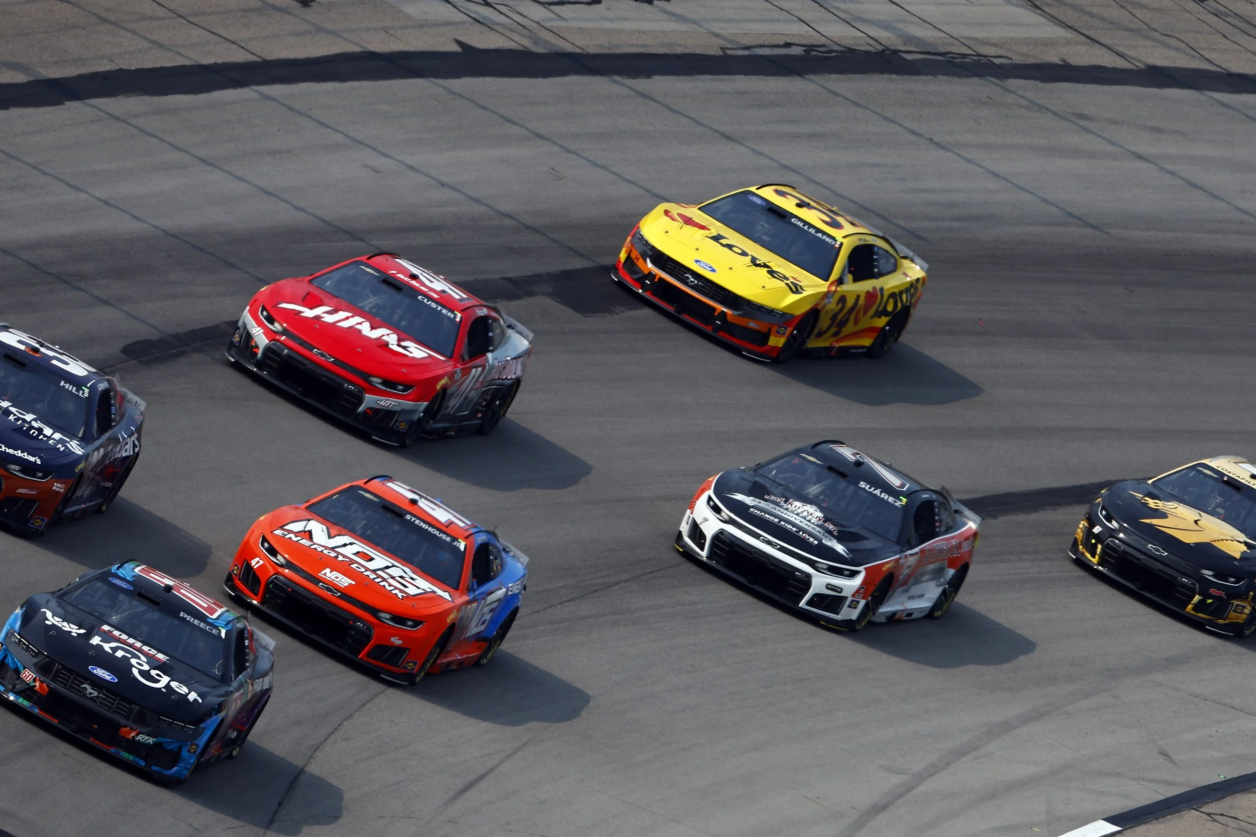 Number 47 NOS Energy Drink races in a pack at the Iowa Corn 350 at the Iowa Speedway