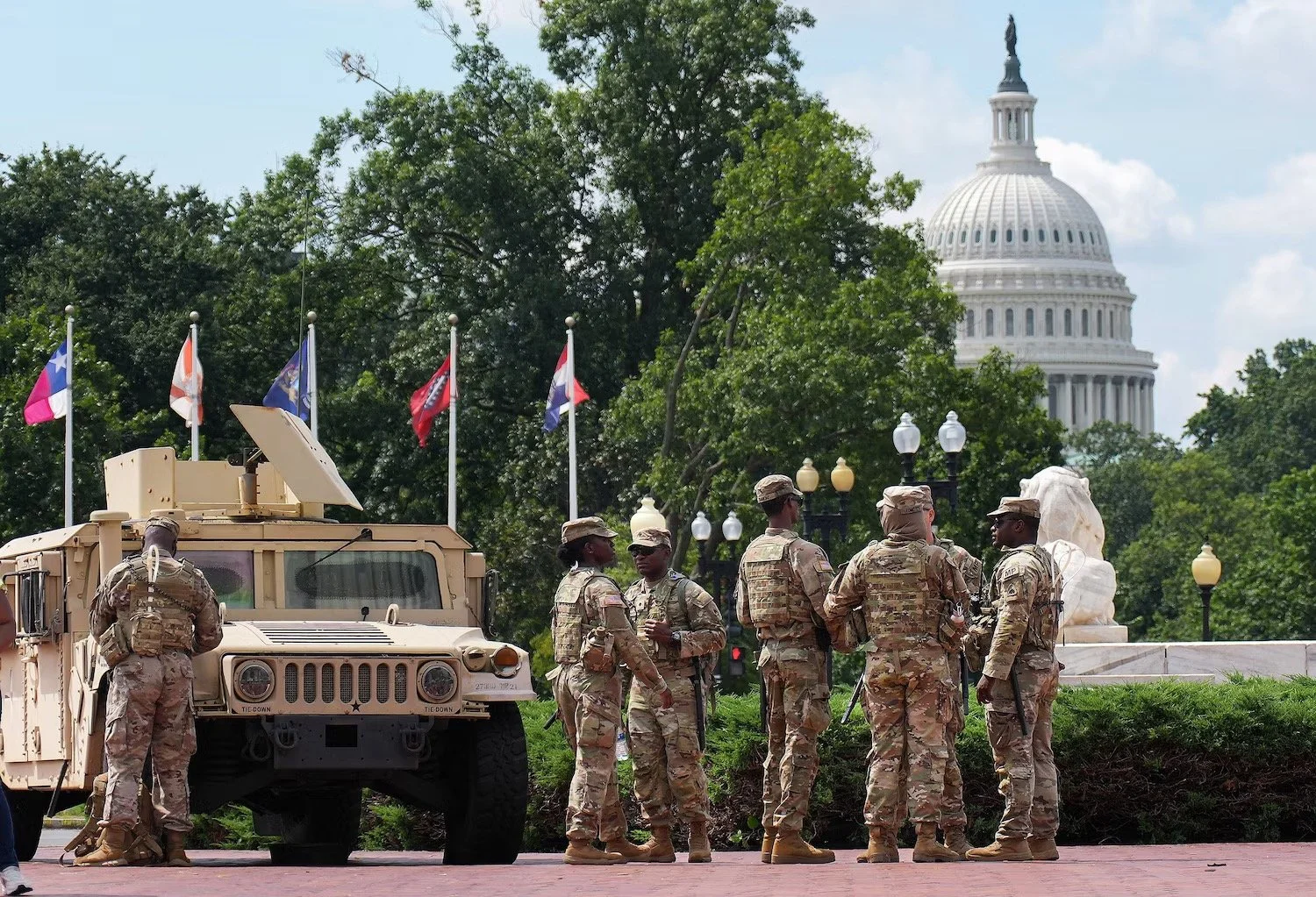 Members of the National Guard stand by at Union Station, August 14, 2025 in Washington. Kevin Dietsch/Getty Images