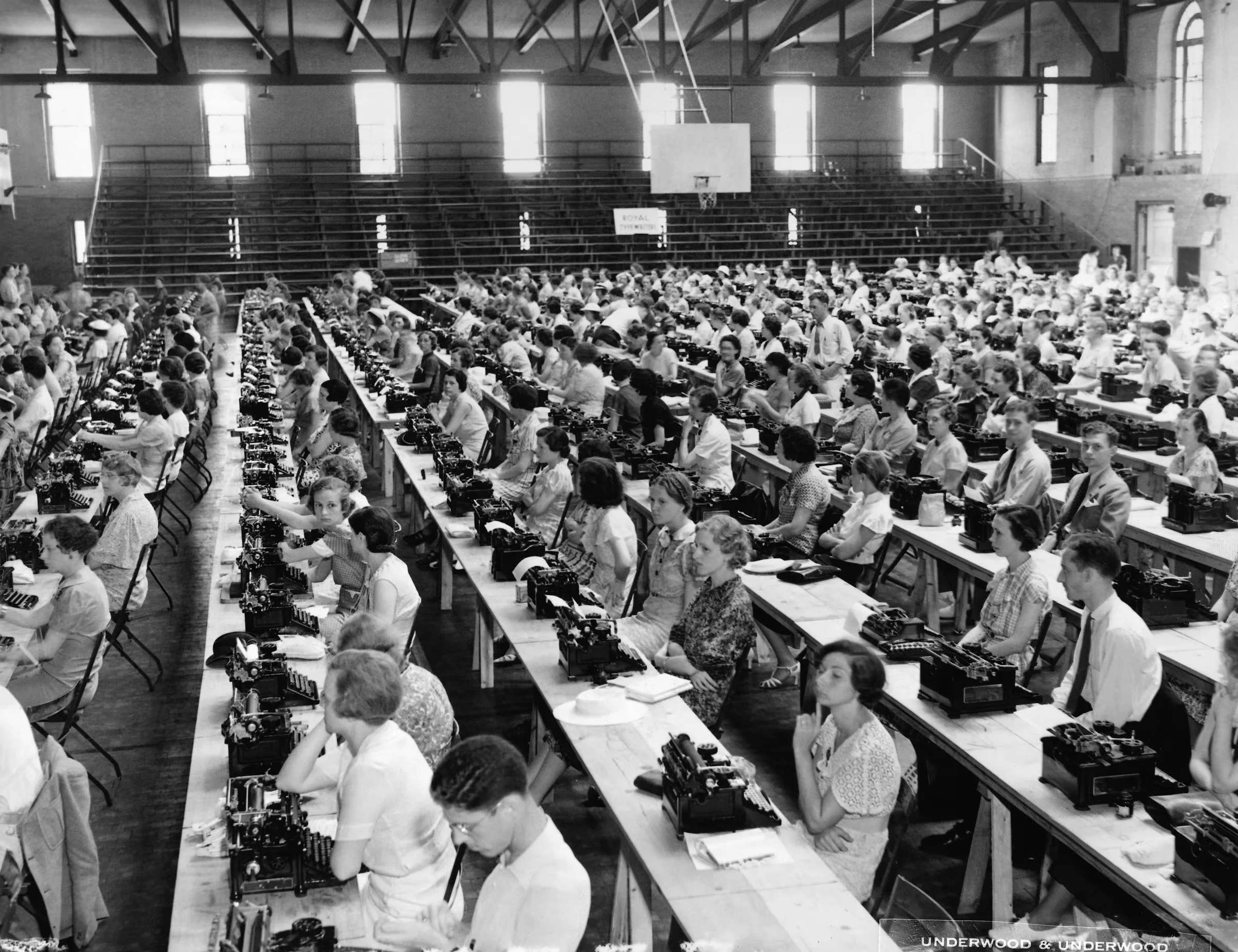 Stenographers and typists taking a civil service exam on July 9, 1936.