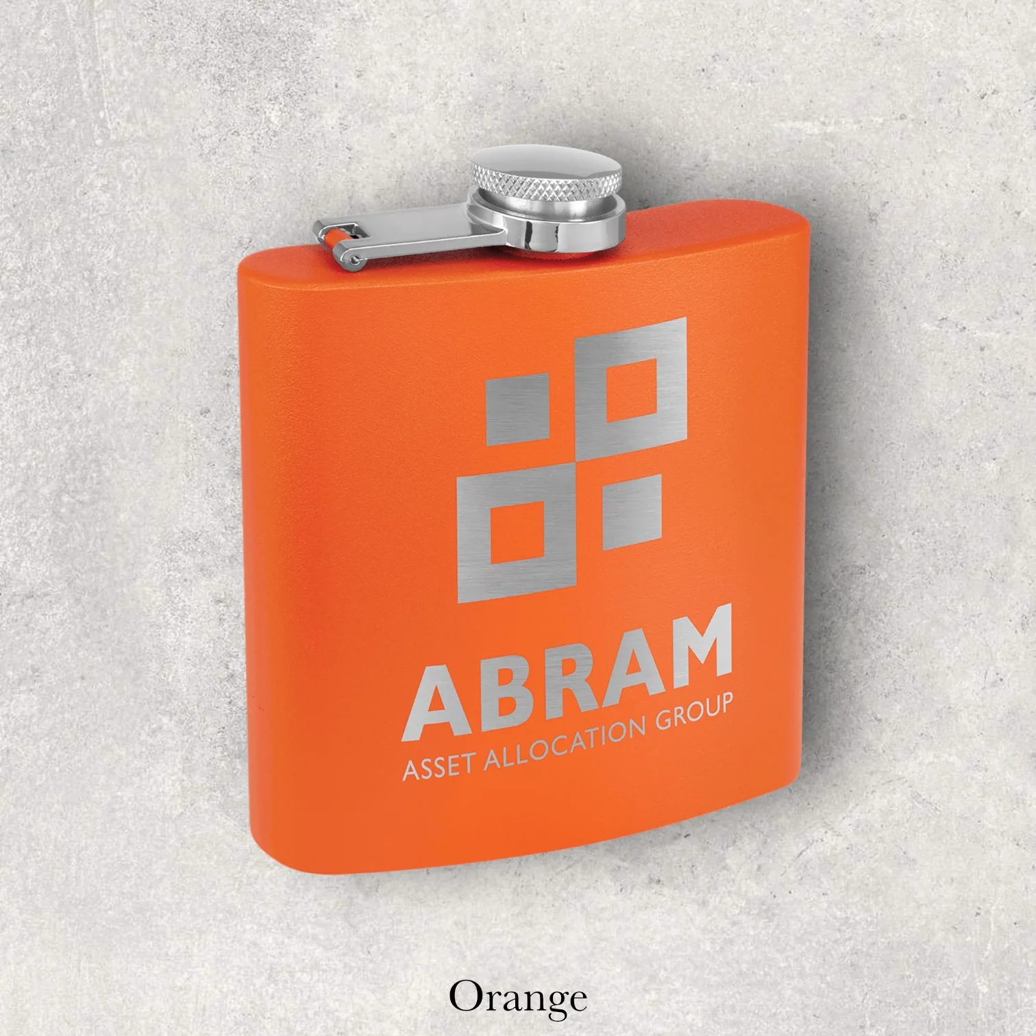 Orange 6oz metal flask engraved with Abram Asset Allocation Group logo, engraved by Lazeric
