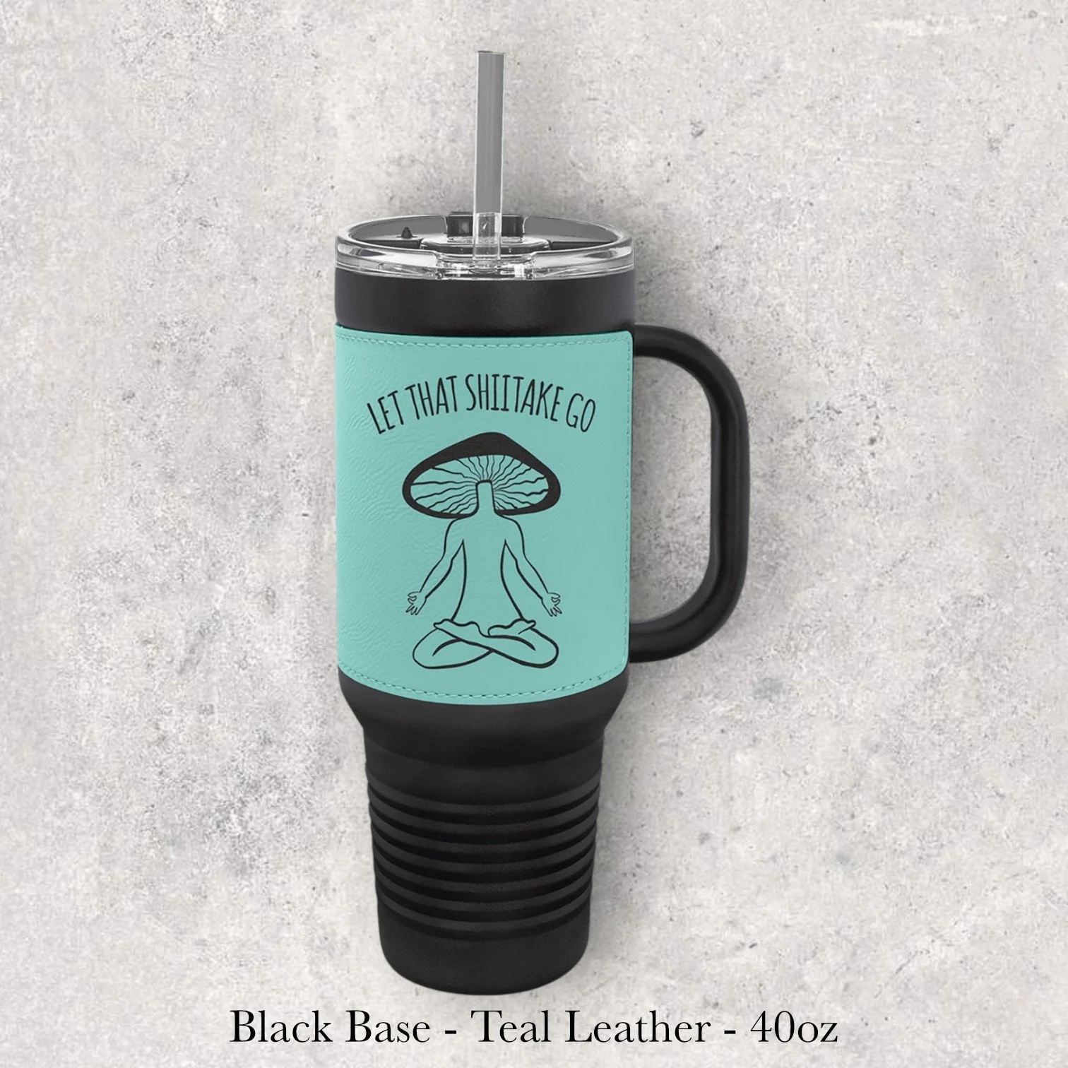 Black base teal leather 40oz travel mug with mushroom illustration and “Let That Shitake Go” text, engraved by Lazeric