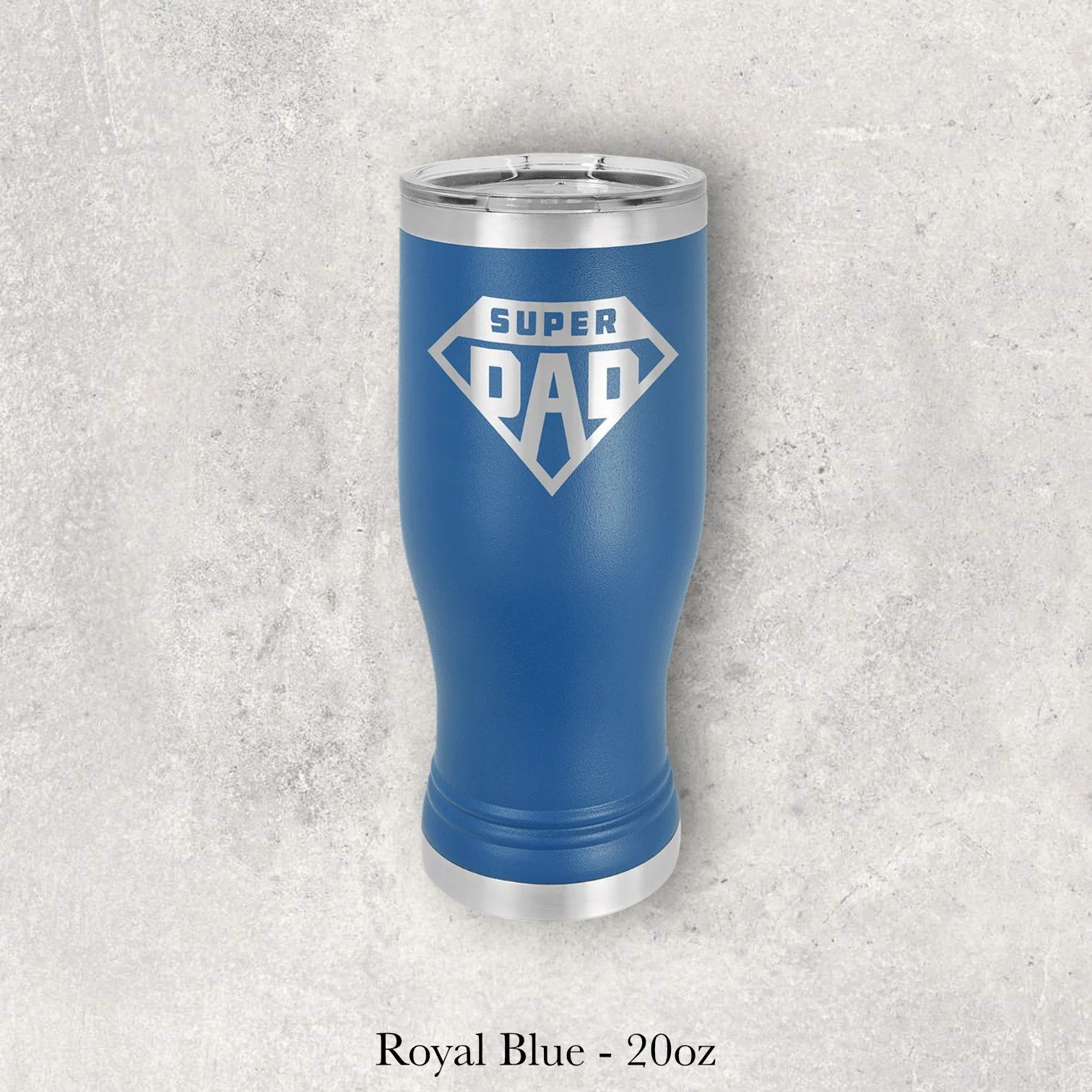 Royal blue 20oz pilsner-style tumbler engraved by Lazeric with a “Super Dad” emblem.