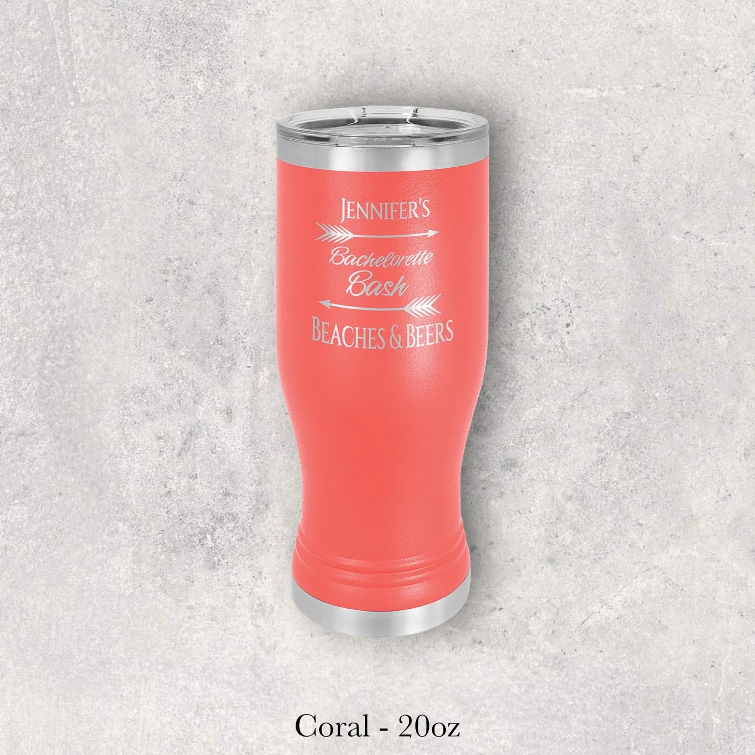 Coral 20oz pilsner-style tumbler engraved by Lazeric with “Jennifer’s Bachelorette Bash – Beaches & Beers” text.