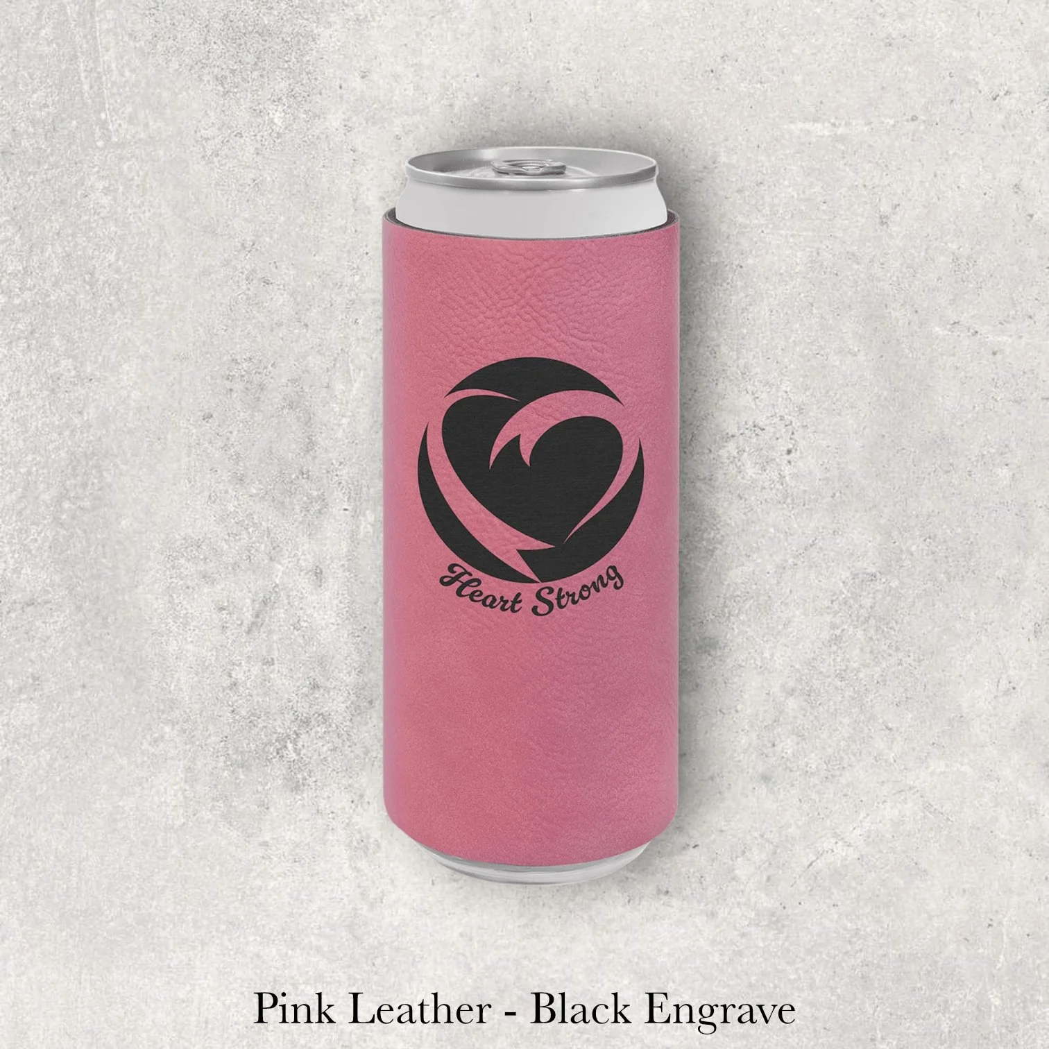Pink leather slim can coozie with black laser-engraved heart swirl logo and text, engraved by Lazeric
